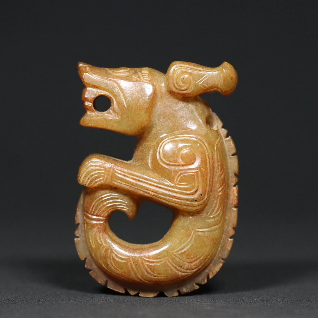 An Exquisite White Jade Dragon Pendant: An Exquisite White Jade Dragon Pendant W.Zhou , China Size:2.3inx1.6inx0.9in Weight:75.3g白玉玉龙挂件 西周时期 Size:5.9cmx4cmx2.4cm 