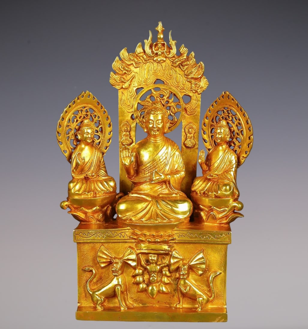 An Exquisite Gilt Bronze Buddha Statue: An Exquisite Gilt Bronze Buddha Statue N.Wei , China Size:10.2inx16.1in Weight:5550g鎏真金佛像 北魏时期 Size:26cmx41cm Weight:5550g