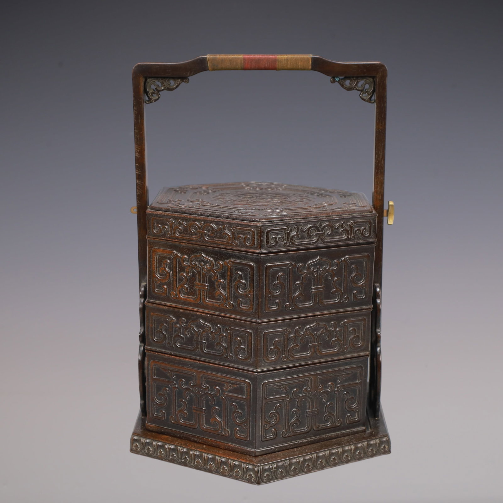 A Exquisite Zitanwood Lotus Pattern Box: A Exquisite Zitanwood Lotus Pattern Box Qing Dynasty, China Size:7.5inx10.8in Weight:1450g紫檀木缠枝莲纹盒 中国清代