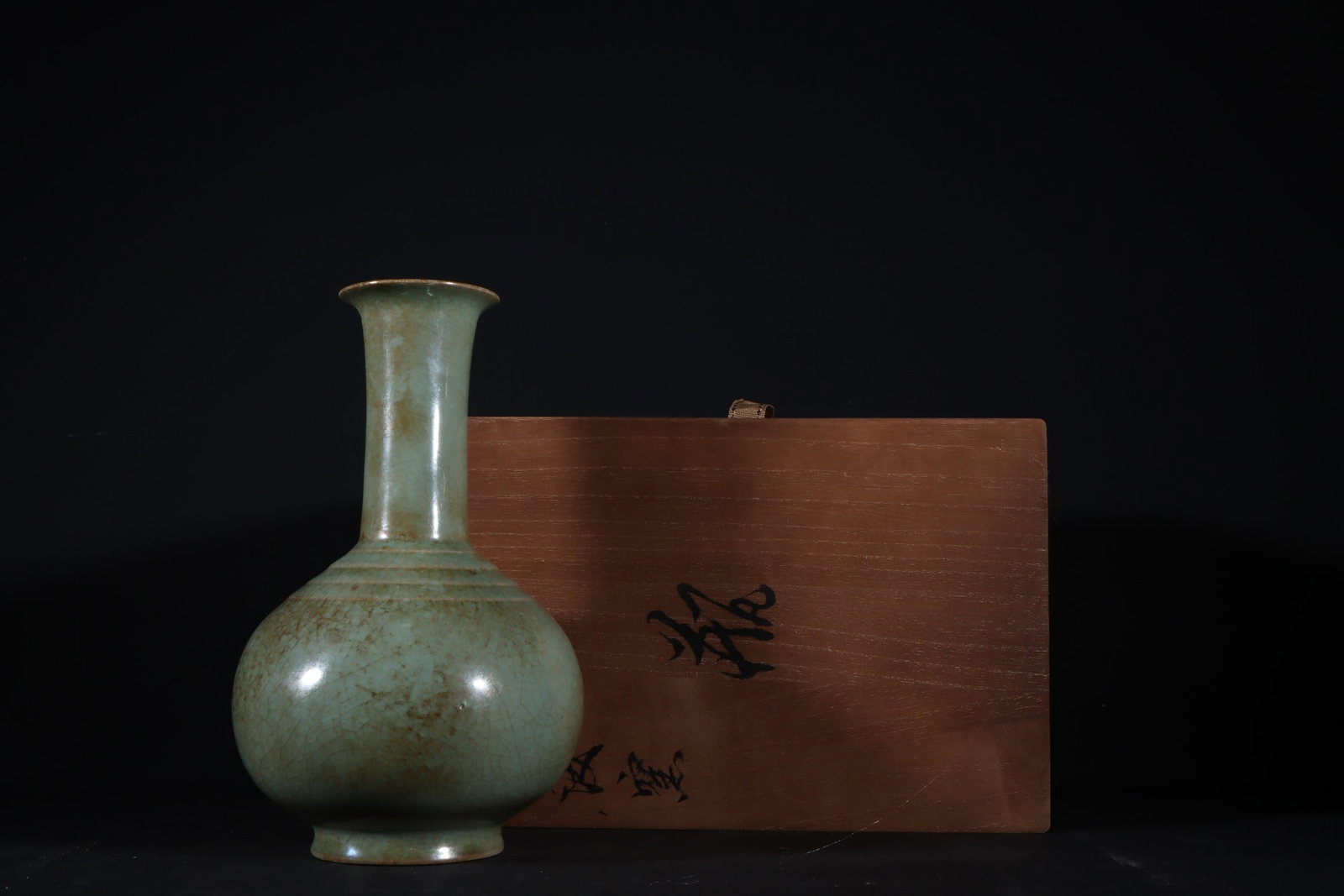 An Exquisite Ru yao Sky Blue Glazed Vase: An Exquisite Ru yao Sky Blue Glazed Vase Song Dynasty, China Size:8.7inx5.3in汝窑天青釉弦纹瓶 中国宋代 Size:22cmx13.5cm