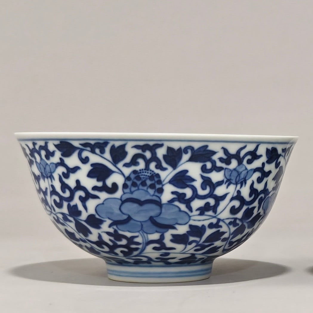 An Exquisite Blue and White Lotus Pattern Bowl: An Exquisite Blue and White Lotus Pattern Bowl Qing Dynasty, China Guangxu Six-character Mark Size:2.4inx4.6in青花缠枝莲图案碗