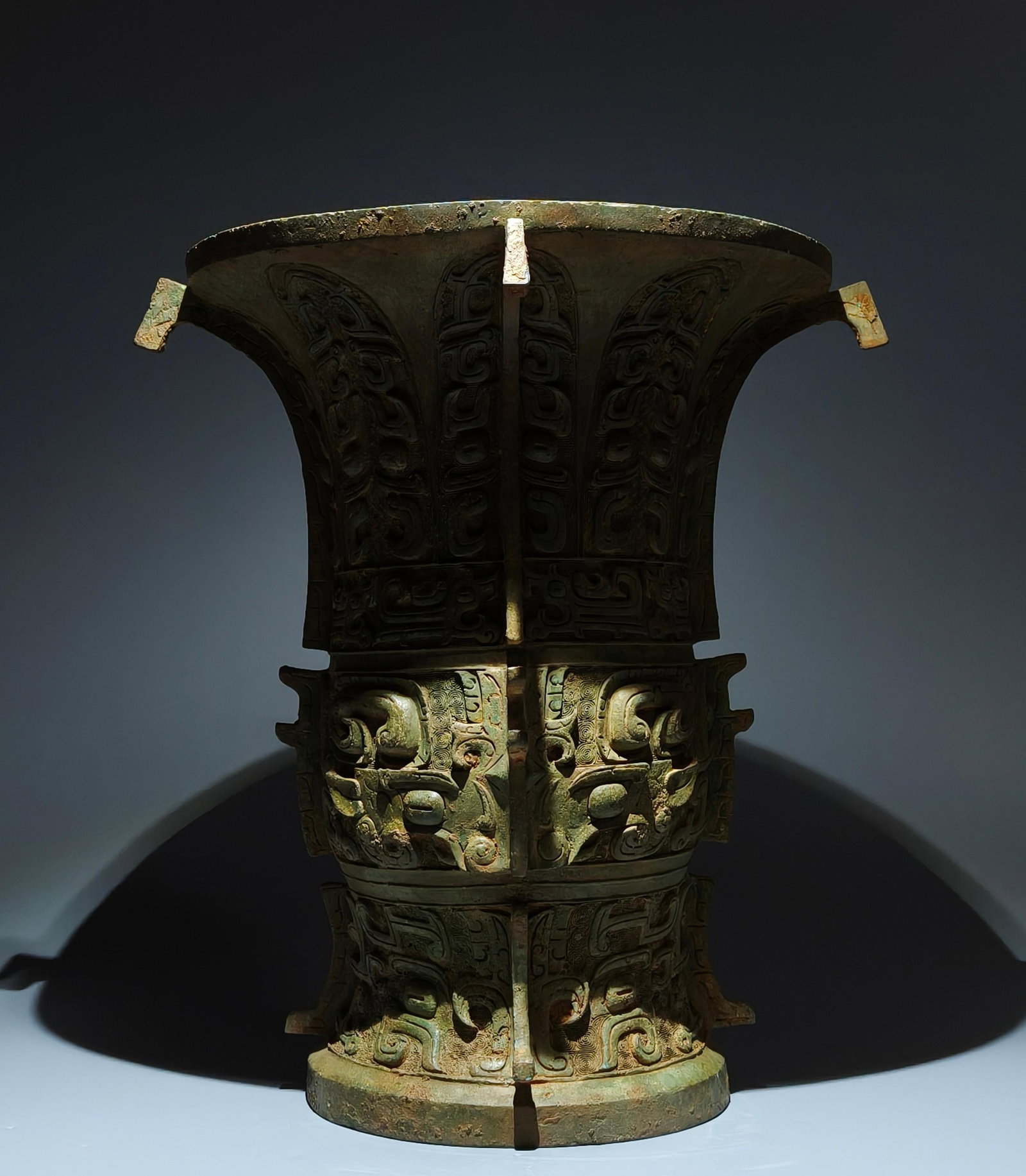 An Archaic Bronze Beast-Face Pattern Libation Cup,With Inscription (1 of 9)