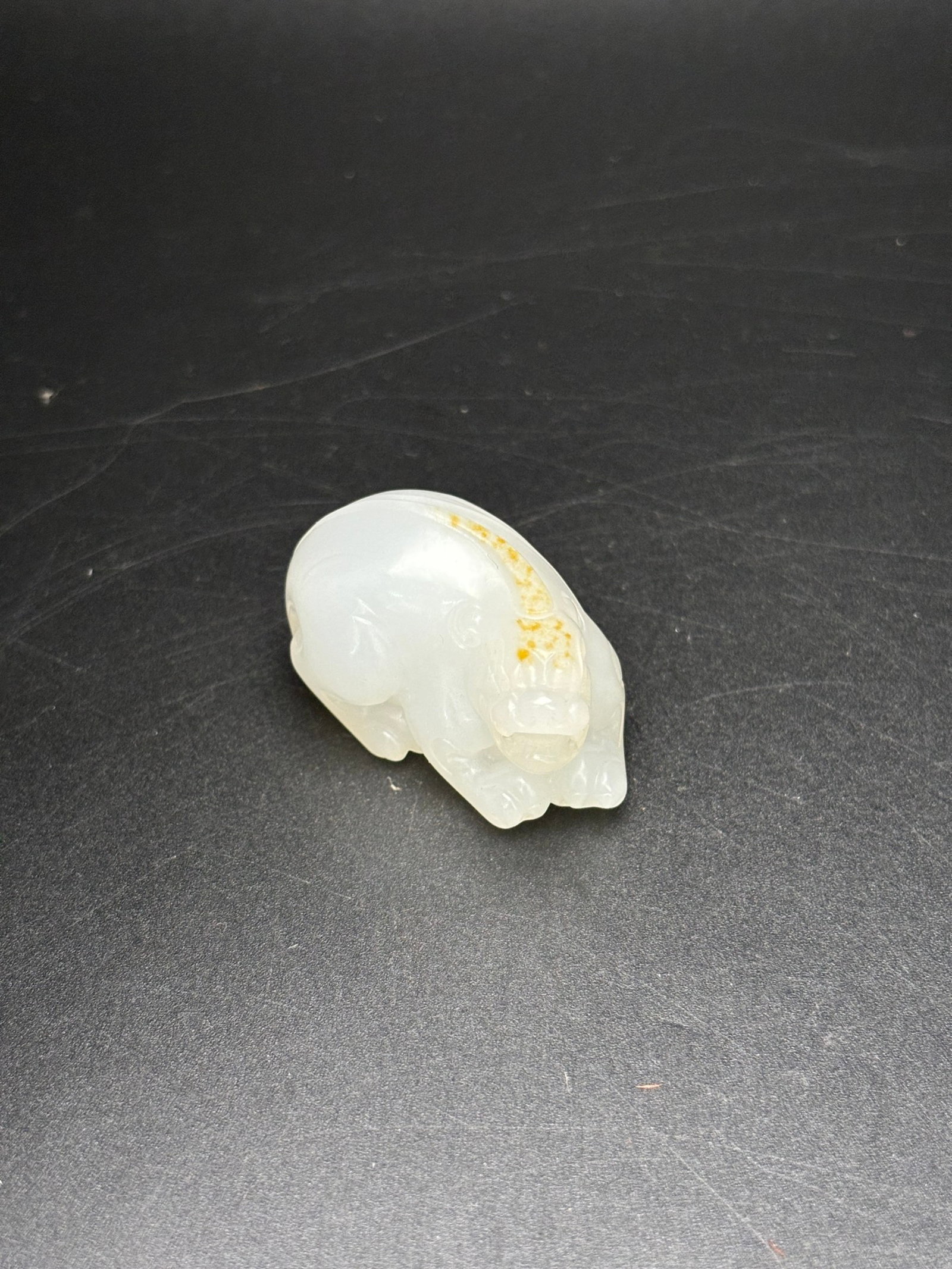 An Exquisite White Jade Auspicious Beast Pendant: An Exquisite White Jade Auspicious Beast Pendant,Qing Dynasty,China,Size:42mmx25mmx25mm,Weight:38g 白玉瑞兽挂件,中国清代