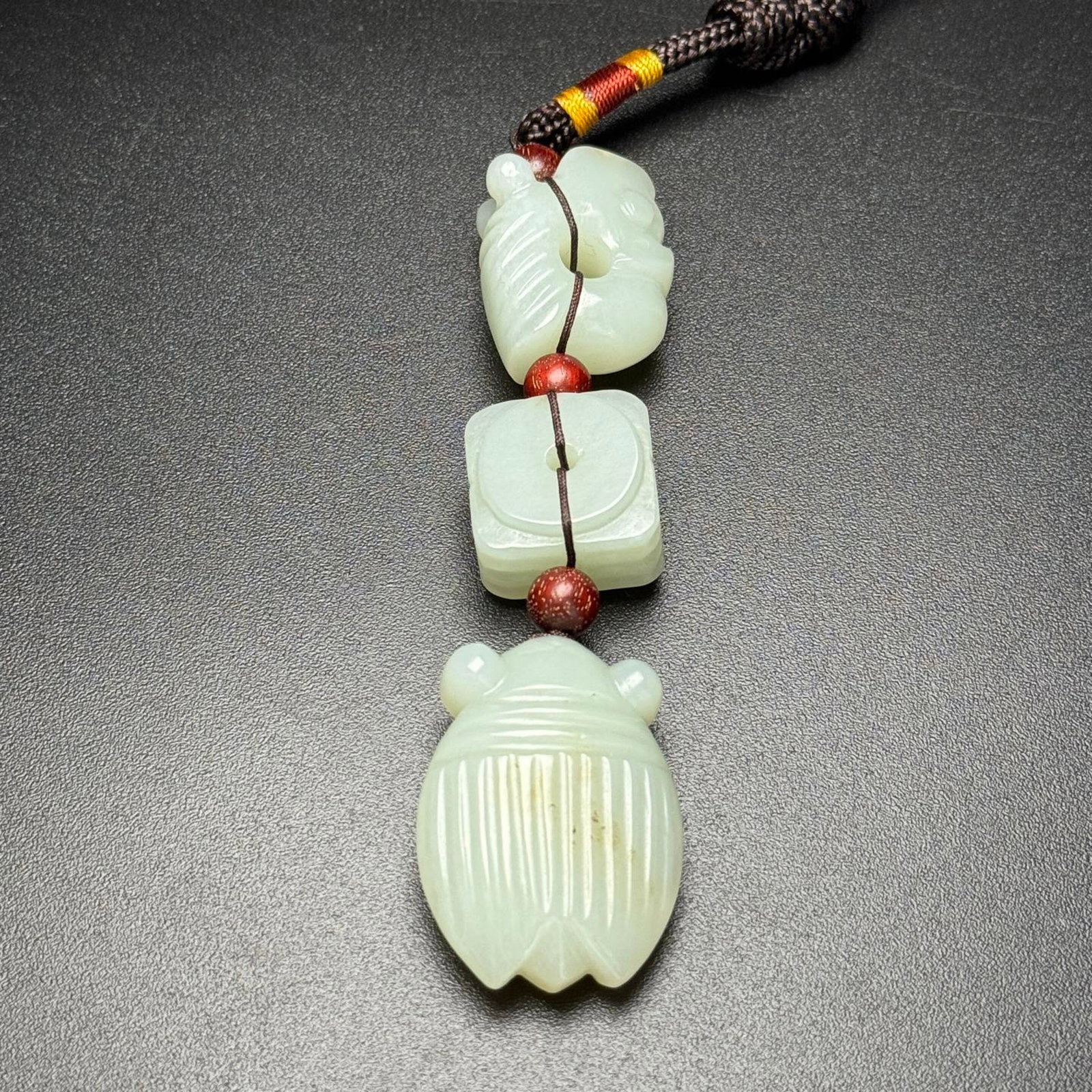 An Exquisite Archaic Jade Cicada Pendant: An Exquisite Archaic Jade Cicada Pendant,Ancient Time,China,Size:111mmx29mmx16mm,Weight:60g 高古玉蝉挂件,中国远古时期