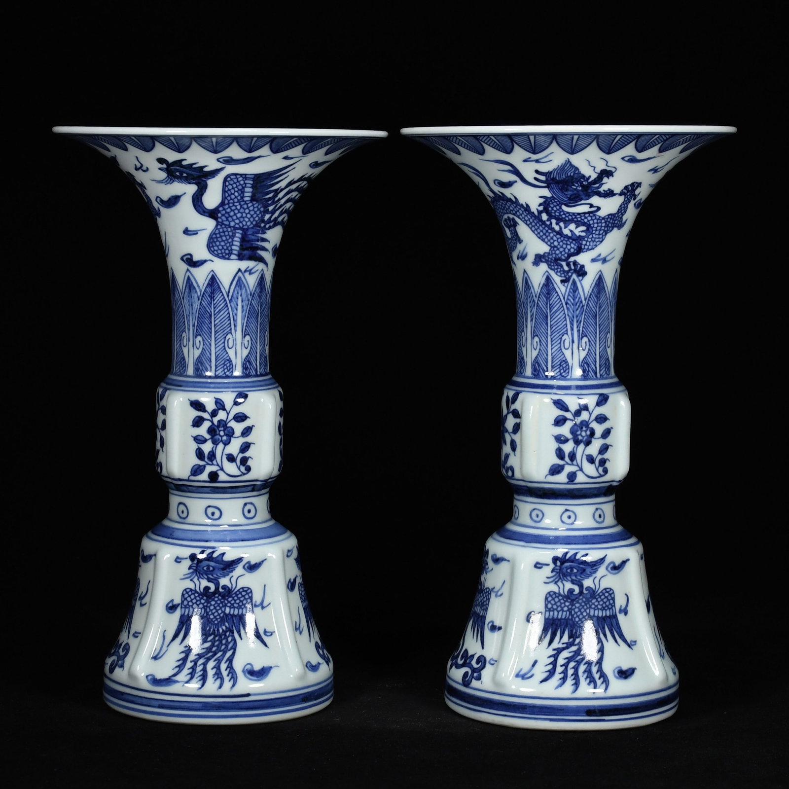 A Pair of Exquisite Blue and White Dragon and Phoenix Pattern Vases: A Pair of Exquisite Blue and White Dragon and Phoenix Pattern Vases,Ming Dynasty,China,Xuande Six-character Mark,Size:10.6inx5.9in 