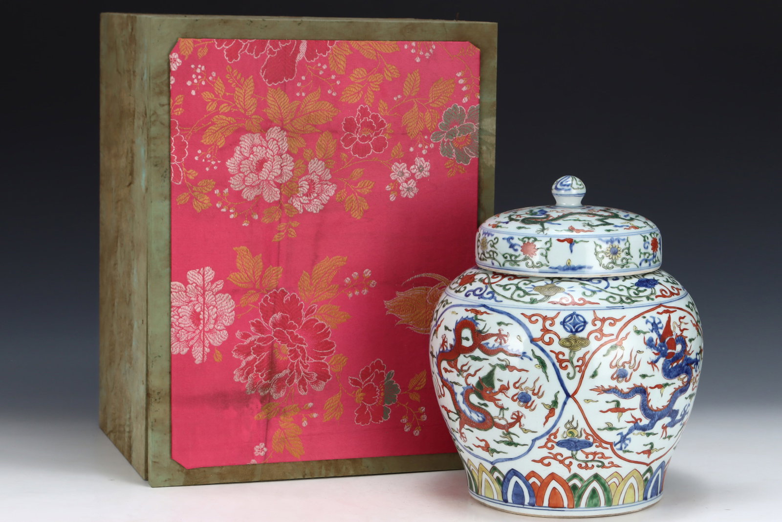 A Rare Blue and White Wucai Auspicious Cloud and Dragon Pattern Jar with Cover (1 of 8)