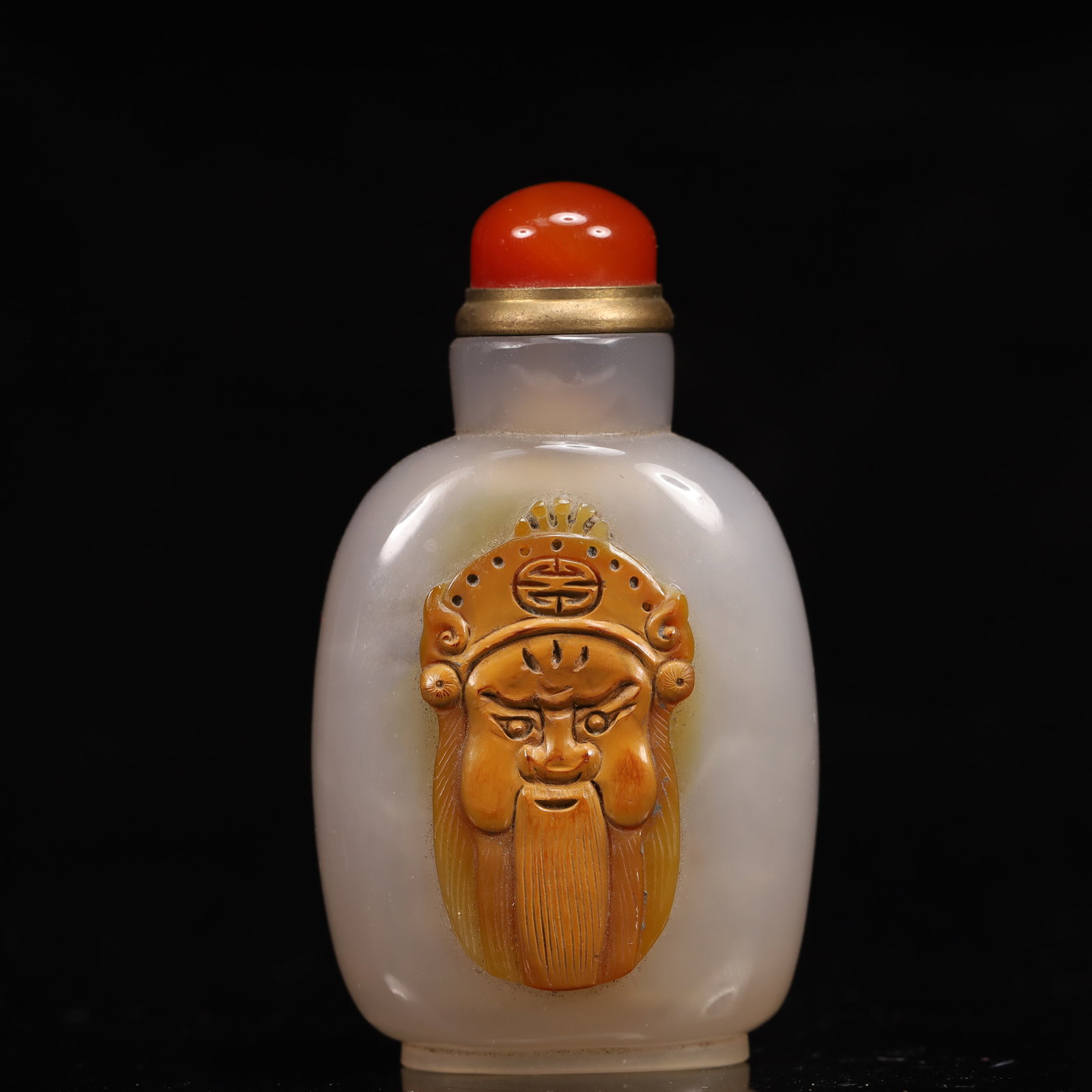 An Exquisite Agate Human-Face Pattern Snuff Bottle: An Exquisite Agate Human-Face Pattern Snuff Bottle,Qing Dynasty, China,Size:1.8inx1inx3in,Weight:63g 玛瑙人面纹鼻烟壶,中国清代