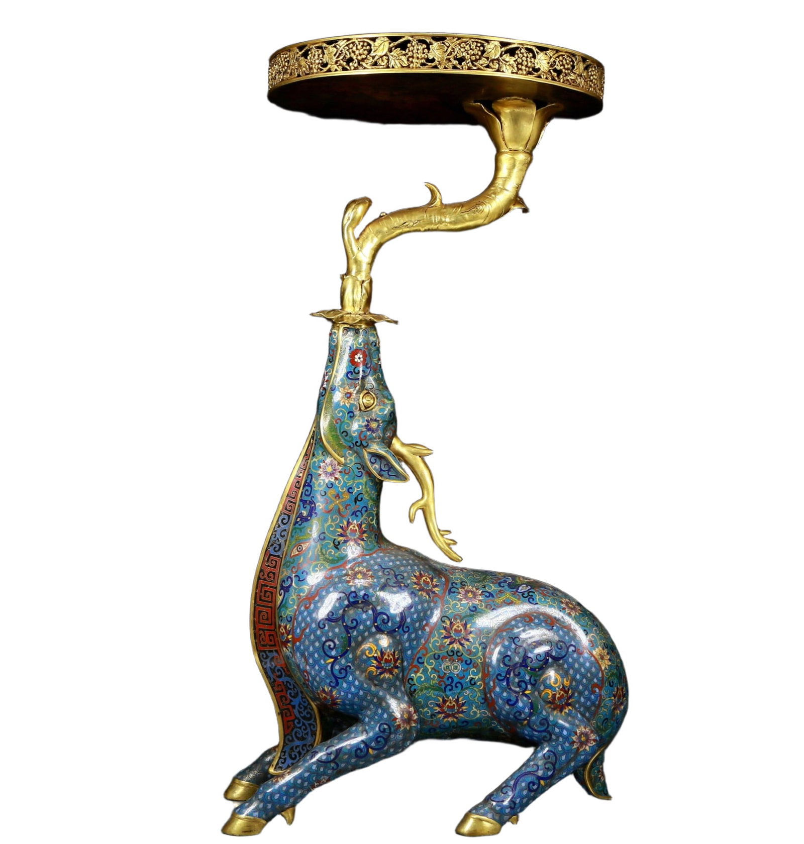 An exquisite cloisonné deer-shaped ornament with lotus pattern: A cloisonné deer-shaped ornament with entwining lotus patterns, Qianlong four-character design, Qing Dynasty, China. The lifelike shape of this ornament, with a gorgeous deer shape as the theme, 