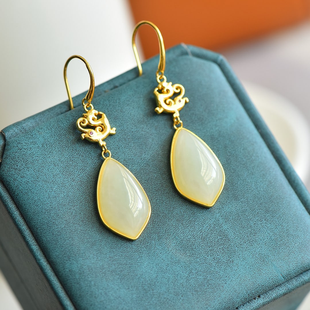 A Pair of Exquisite Sterling Silver-Gold Plated Inlaid White Jade Earrings: A Pair of Exquisite Sterling Silver-Gold Plated Inlaid White Jade Earrings,Size:11mmx20mm 一对纯银镀金镶白玉耳环