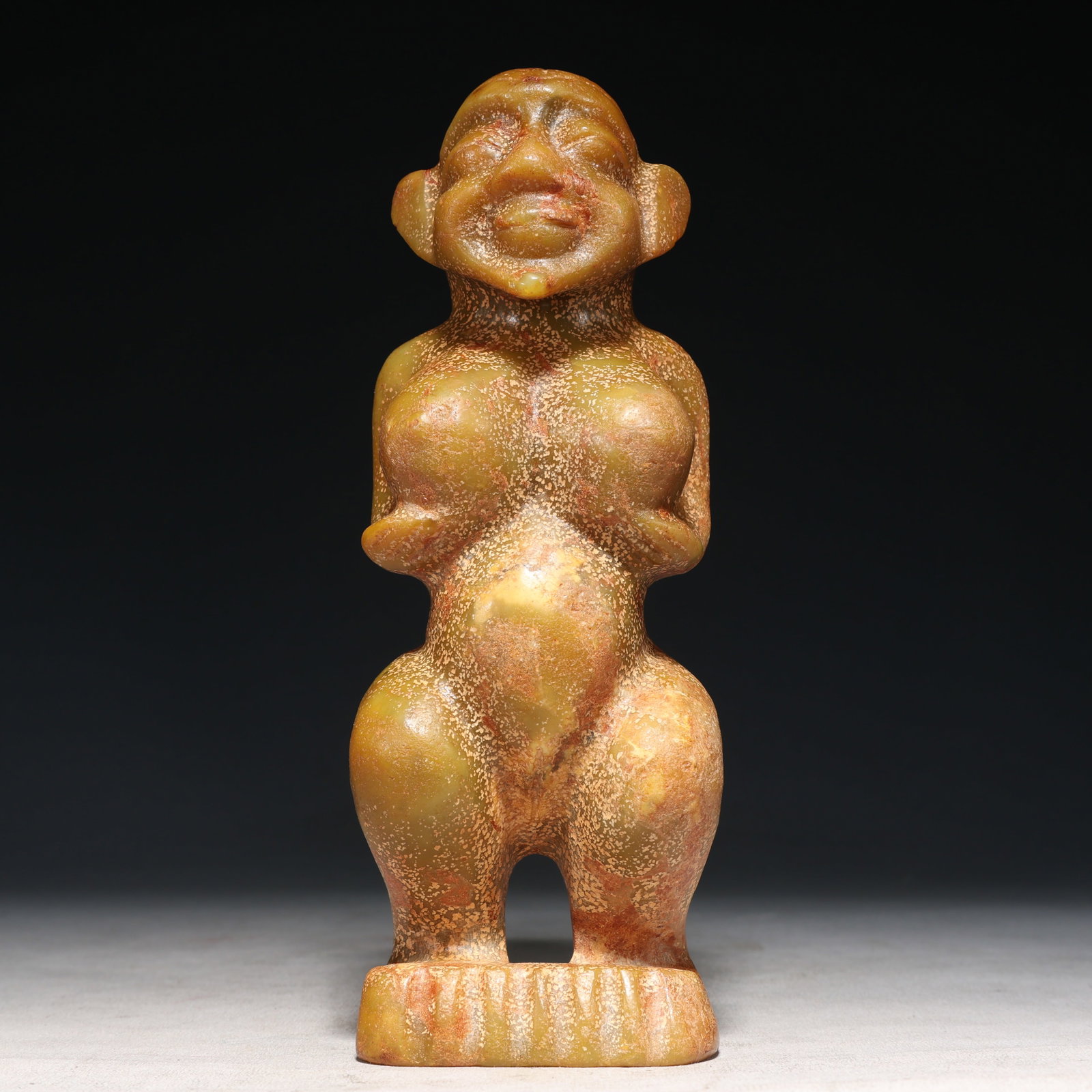 An Archaic Hongshan Culture Yellow Jade Figure Ornament: An Archaic Hongshan Culture Yellow Jade Figure Ornament,Ancient Time, China,Size:3.1inx2.2inx8.7in Weight:1550g 红山文化黄玉人物摆件,新