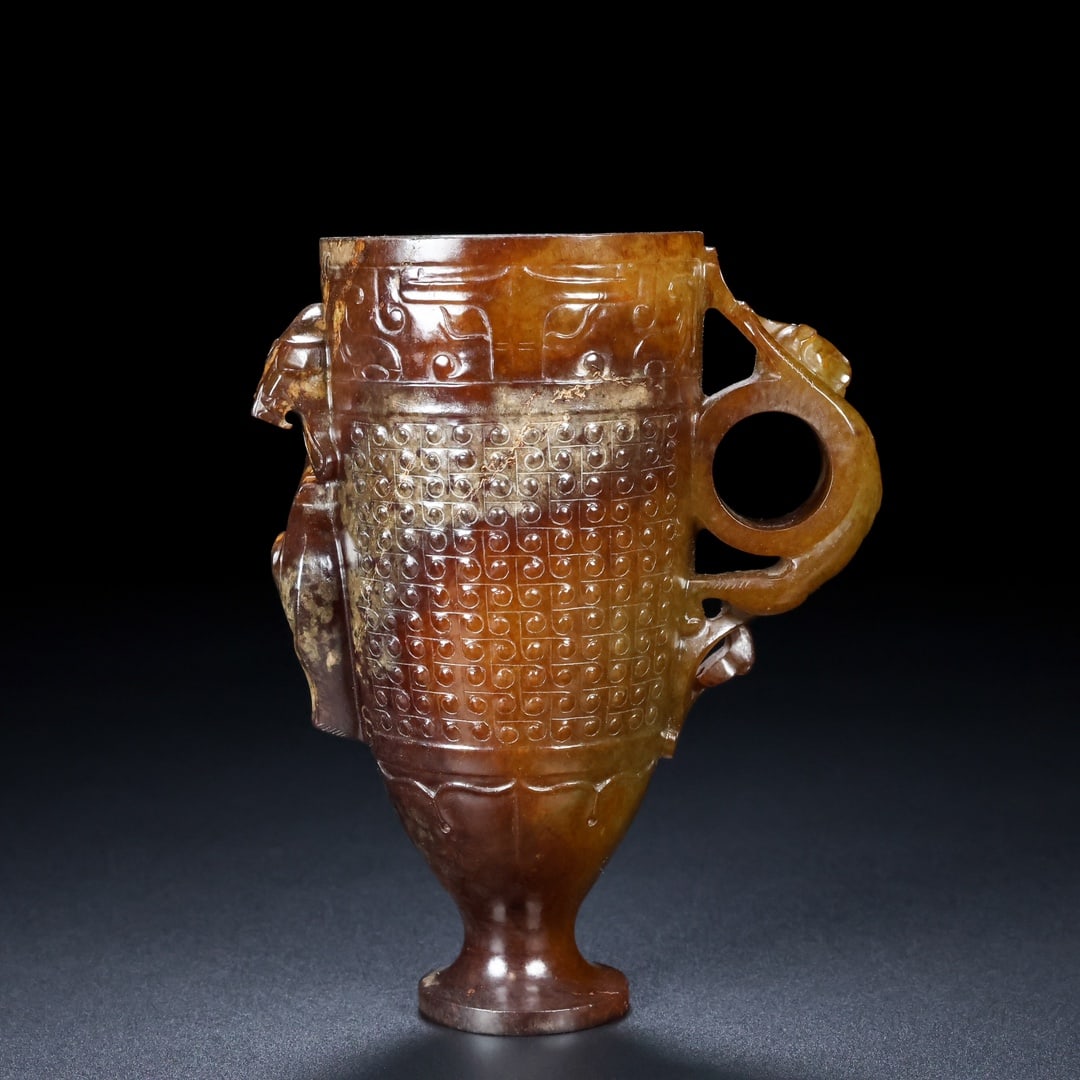 A Exquisite Hotan Jade Dragon Ears Cup: A Exquisite Hotan Jade Dragon Ears Cup,Hang Dynasty, China,Size:3.9inx2.4inx4.9in,Weight:231g 和田玉龙耳杯,中国汉代