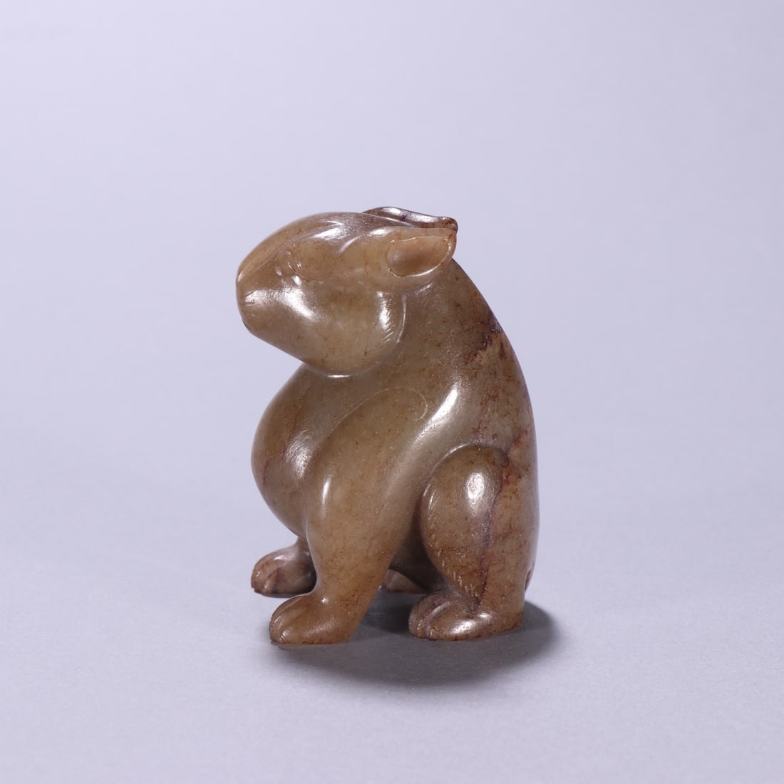A Exquisite Gaogu Jade Rabbit Ornament: A Exquisite Gaogu Jade Rabbit Ornament,Han Dynasty, China,Size:2.6inx1.9in,Weight:170g 高古玉兔摆件,中国汉代