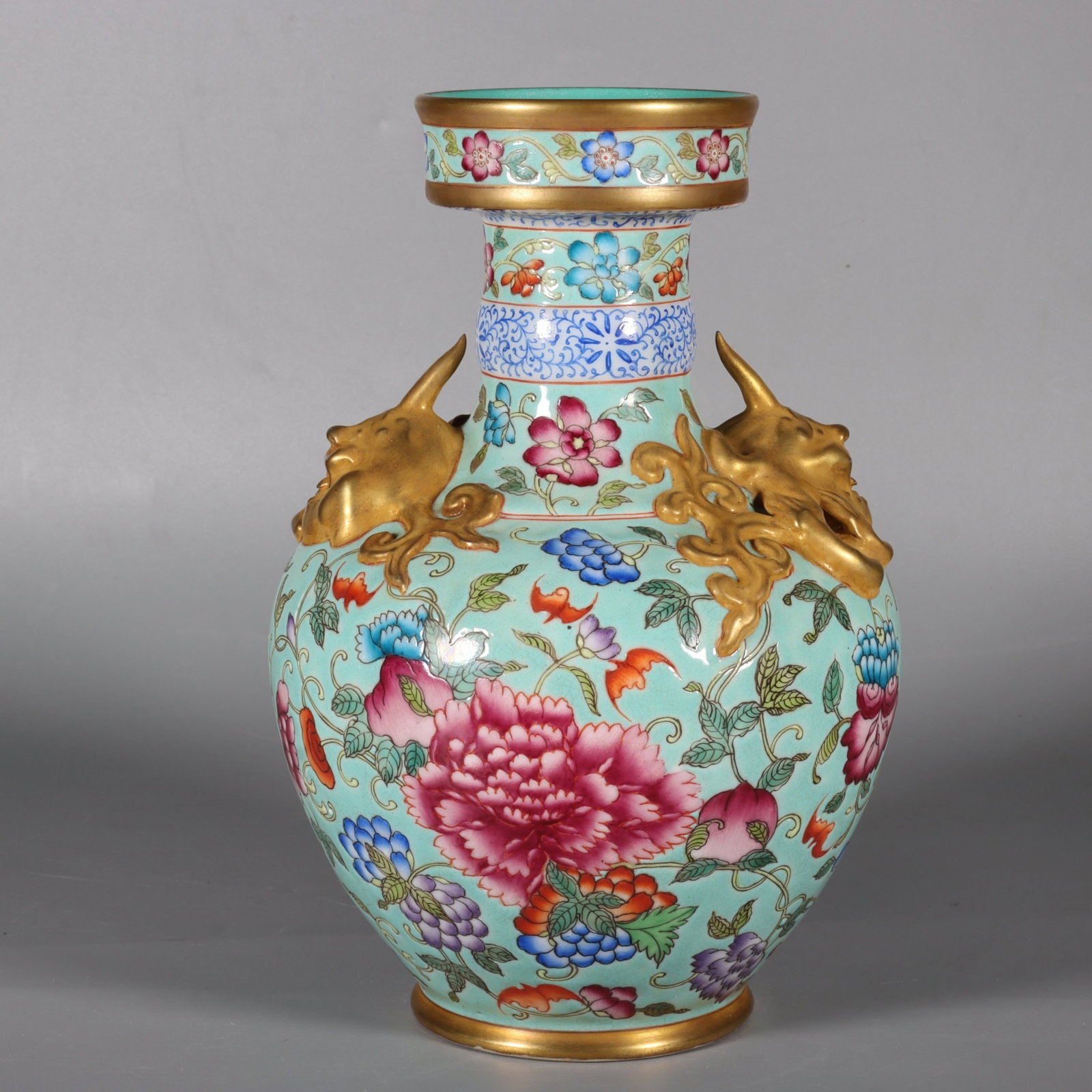 An Exquisite Famille-Rose Painted Gold Turquoise Ground Flower Pattern Beast-Ears Vase: An Exquisite Famille-Rose Painted Gold Turquoise Ground Flower Pattern Beast-Ears Vase,Qing Dynasty, China,Qianlong Four-character Mark,Size:8.8inx3.1inx3.4in 粉彩描金松&