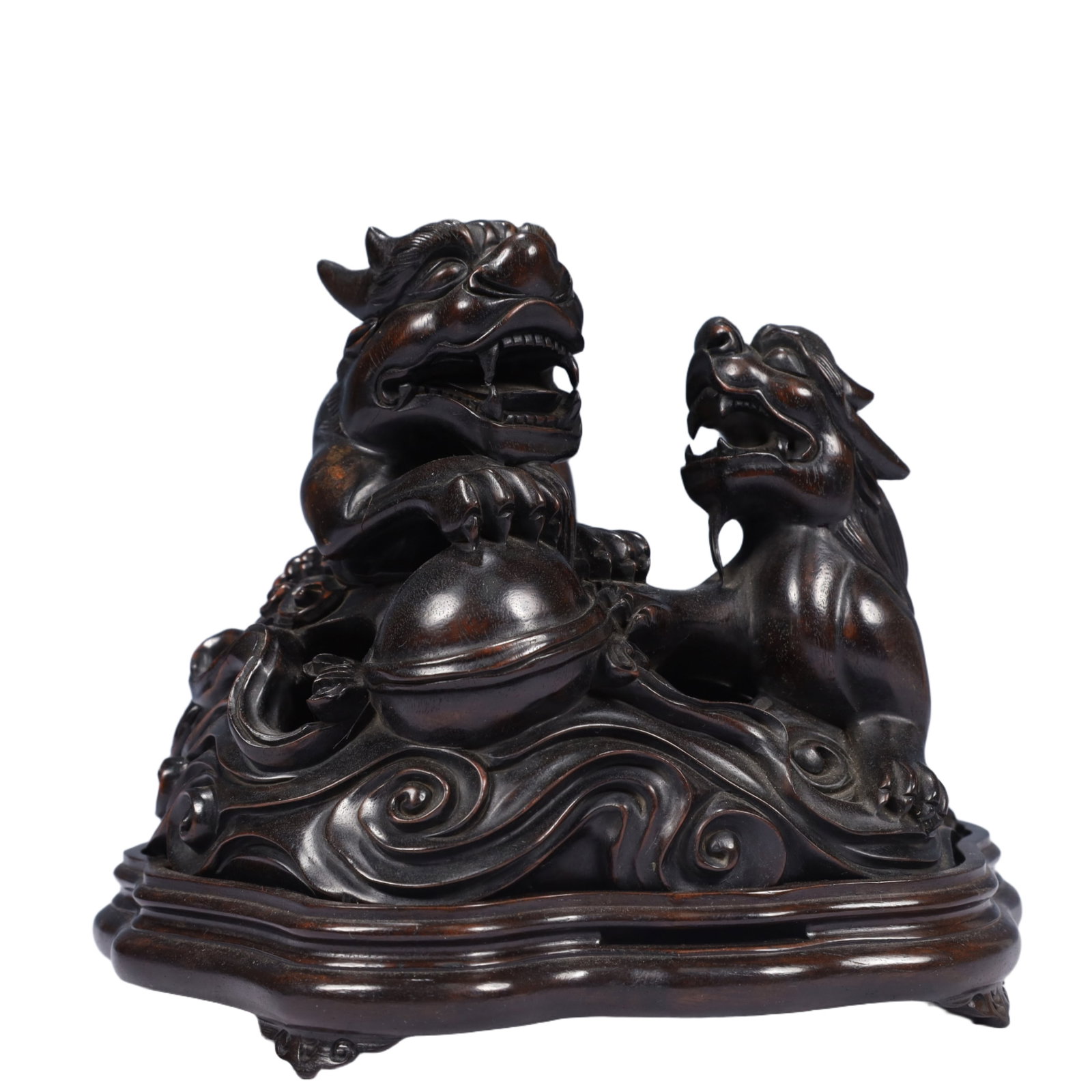 An Exquisite Zitanwood Lion Ornament,With Base: An Exquisite Zitanwood Lion Ornament,With Base,Qing Dynasty, China,Size:7.1inx5.9inx6.3in,Weight:1150g 紫檀木狮子摆件,带底座,中国