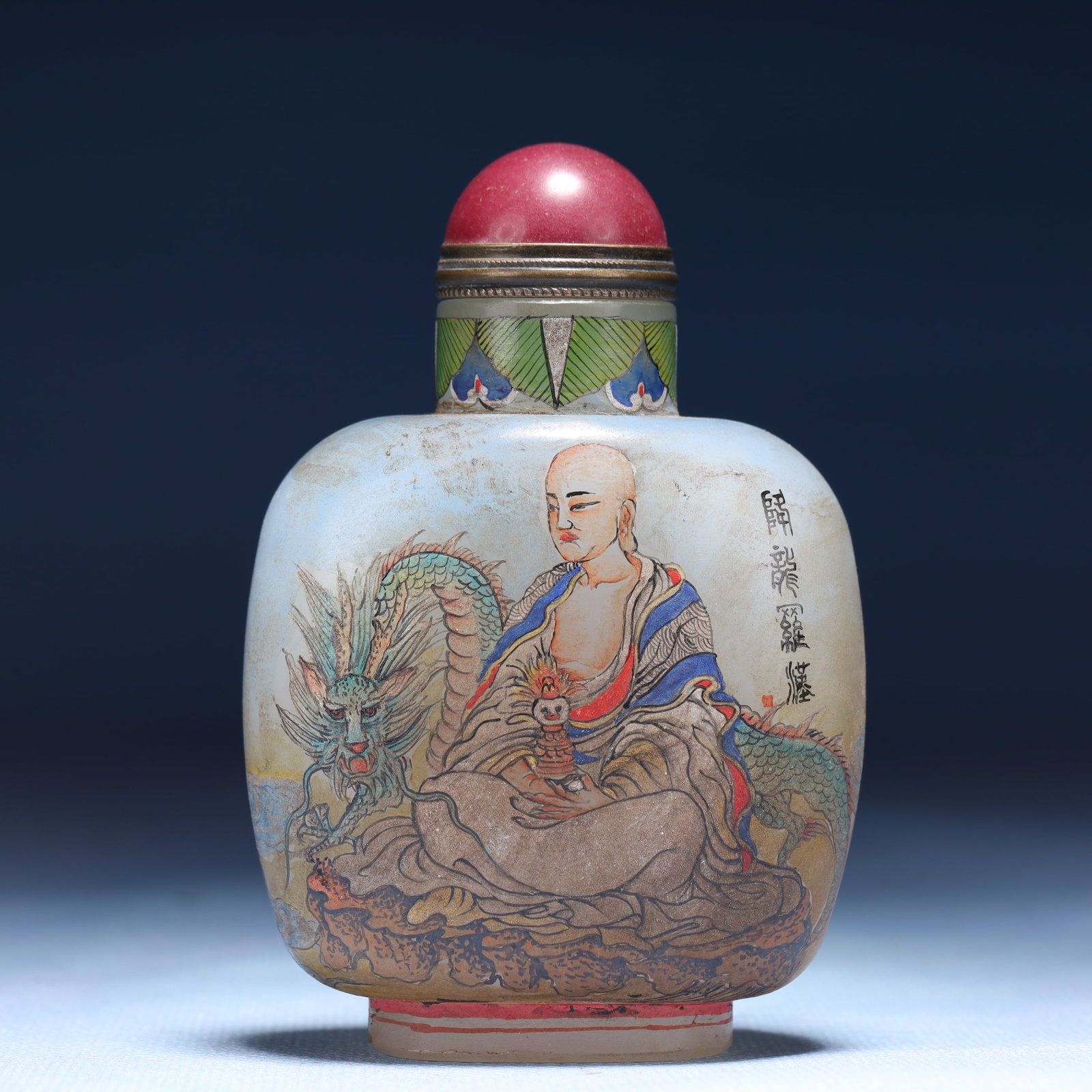 An Exquisite Glass Figure Pattern Snuff Bottle: An Exquisite Glass Figure Pattern Snuff Bottle,Qing Dynasty,China,Qianlong Four-character Mark,Size:2.4inx1.4inx3.5in,Weight:125g