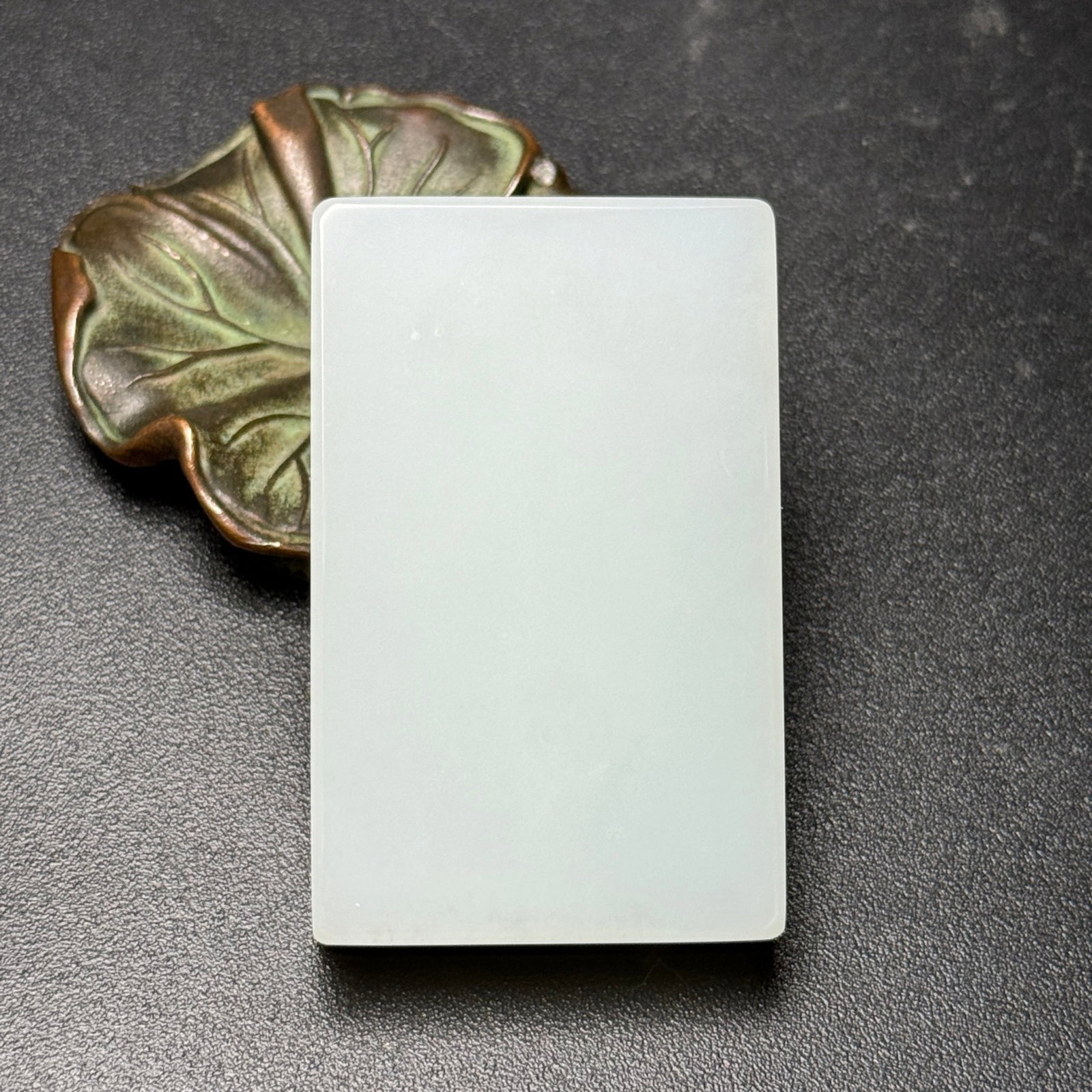 An Exquisite White Jade Pendant: An Exquisite White Jade Pendant,Qing Dynasty,China,Size:35mmx55mmx11mm,Weight:61g 白玉挂件,中国清代