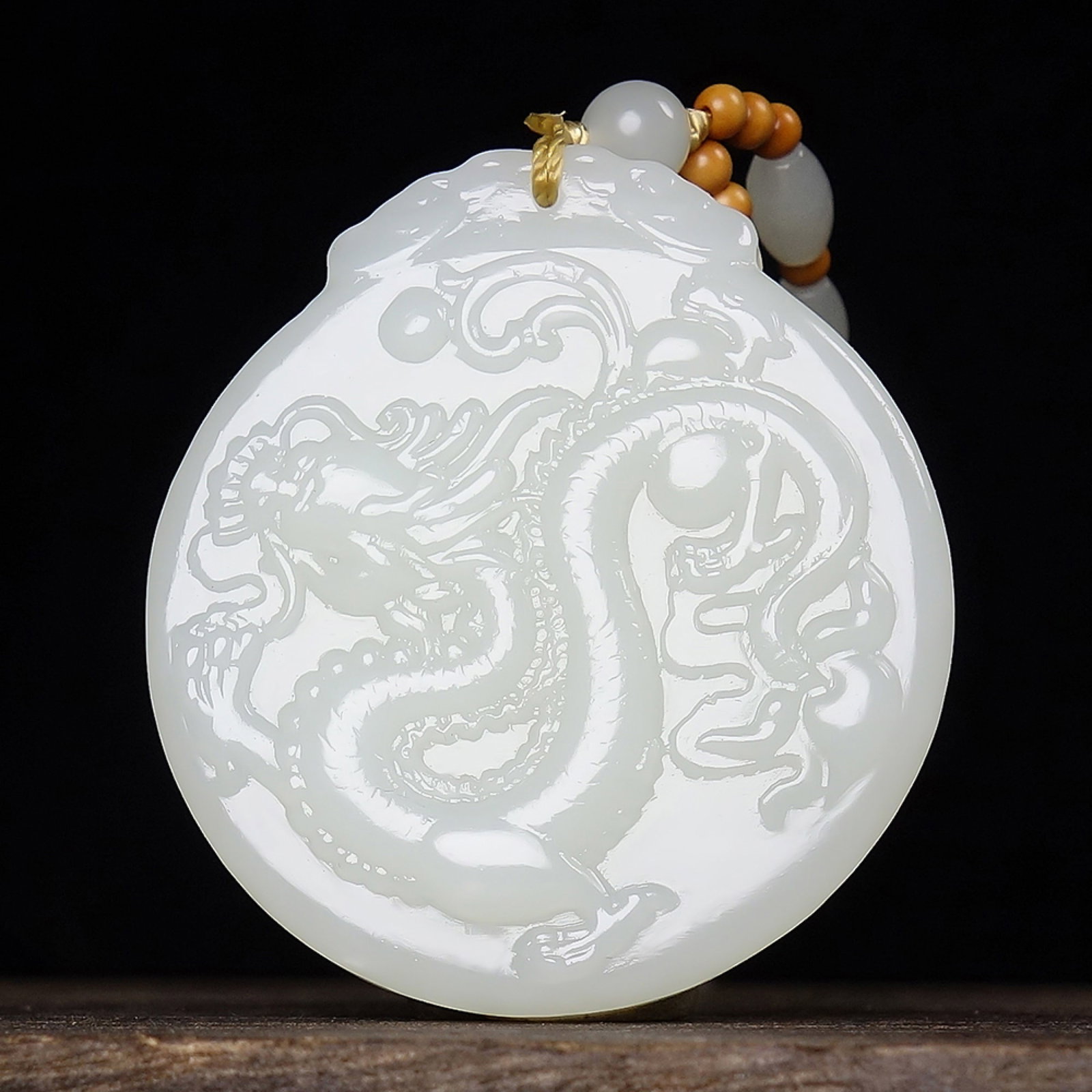 An Exquisite White Jade Dragon Pattern Pendant: An Exquisite White Jade Dragon Pattern Pendant,Size:47mmx42mmx7mm 白玉龙纹挂件