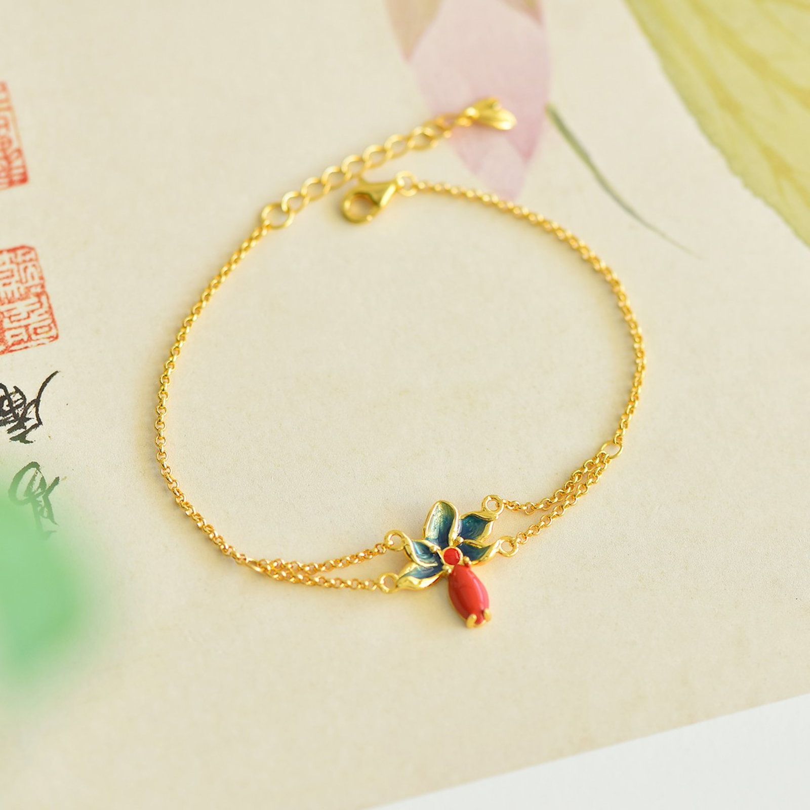 An Exquisite Sterling Silver-Gold Plated Inlaid Cinnabar Bracelets: An Exquisite Sterling Silver-Gold Plated Inlaid Cinnabar Bracelets,Size:4mmx8mm 寓意:好运相伴,幸福美满 纯银镀金ž