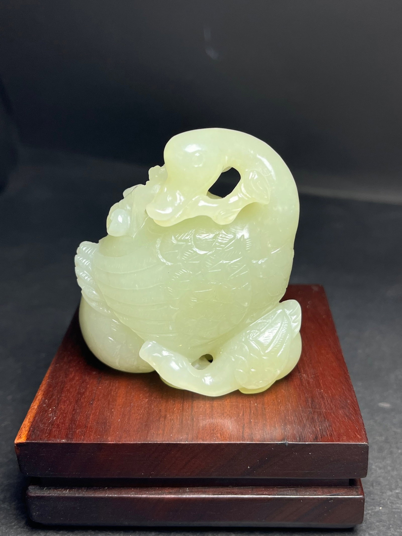 An Exquisite Yellow Jade Goose Hand Piece: An Exquisite Yellow Jade Goose Hand Piece,Qing Dynasty,China,Size:63mmx34mmx58mm,Weight:153g 黄玉鹅手把件,中国清代