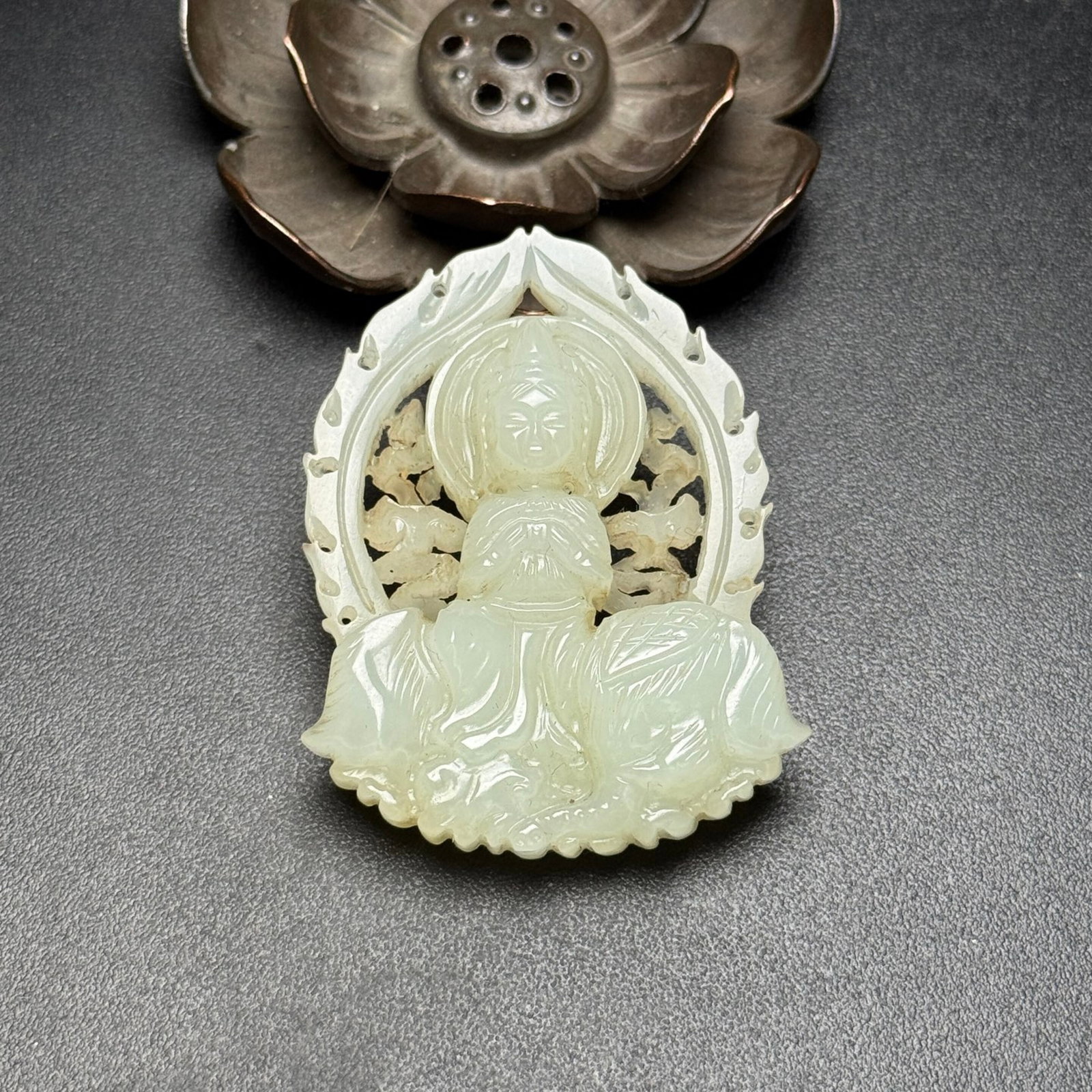 An Exquisite White Jade Hollow Buddha Statue Pattern Pendant (1 of 7)