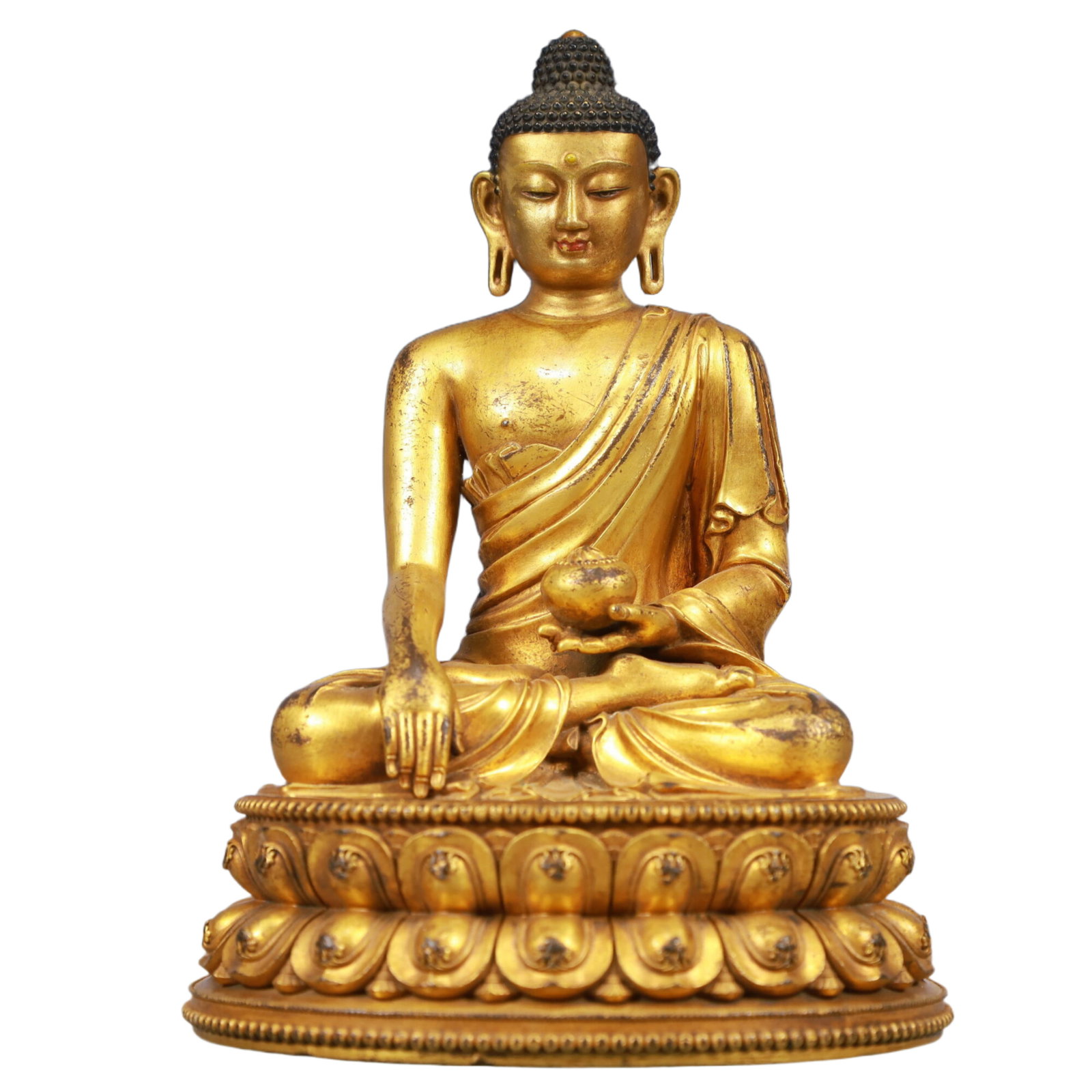 A Solemn Gilt Bronze Statue of Sakyamuni: A Solemn Gilt Bronze Statue of Sakyamuni, Ming Dynasty, China, Yongle Six-character Mark, Size:5.5inx5.1inx7.5in, Weight:1650g 铜鎏金如来像,中国明