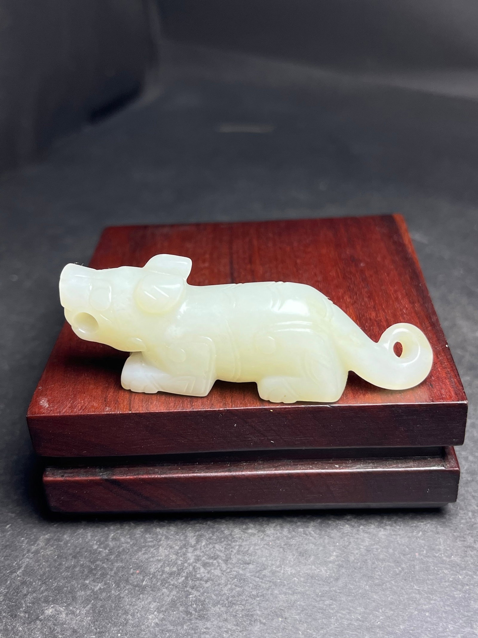 An Exquisite White Jade Auspicious Beast Pendant: An Exquisite White Jade Auspicious Beast Pendant,Qing Dynasty,China,Size:66mmx15mmx24mm,Weight:31g 白玉瑞兽挂件,中国清代