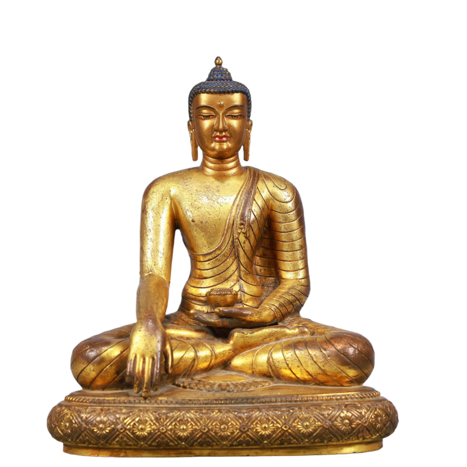 A Solemn Gilt Bronze Statue of Sakyamuni: A Solemn Gilt Bronze Statue of Sakyamuni, Qing Dynasty, China, Qianlong Mark, Size:7.9inx4.7inx9.1in, Weight:2550g 铜鎏金释迦摩尼像,中国