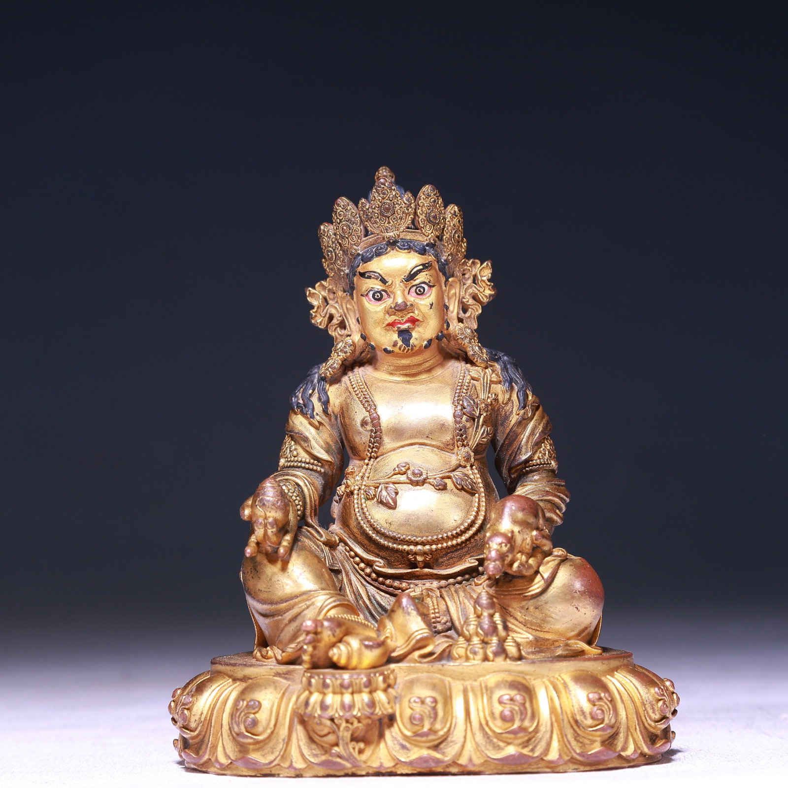 A Solemn Gilt Silver Statue of Mammon: A Solemn Gilt Silver Statue of Mammon,Qing Dynasty,China,Size:3.1inx2.8inx3.9in,Weight:300g 纯银鎏金财神像,中国清代