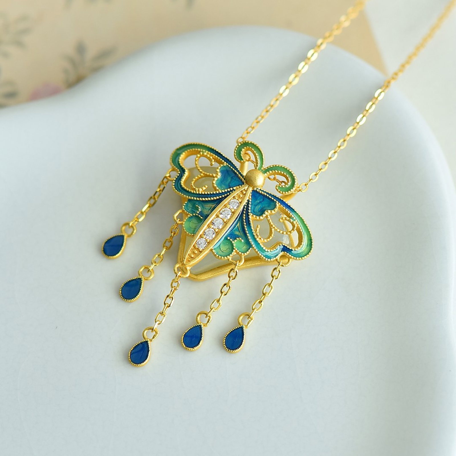 An Exquisite Sterling Silver-Gold Plated Inlaid White Jade Pendant: An Exquisite Sterling Silver-Gold Plated Inlaid White Jade Pendant 纯银镀金镶白玉吊坠