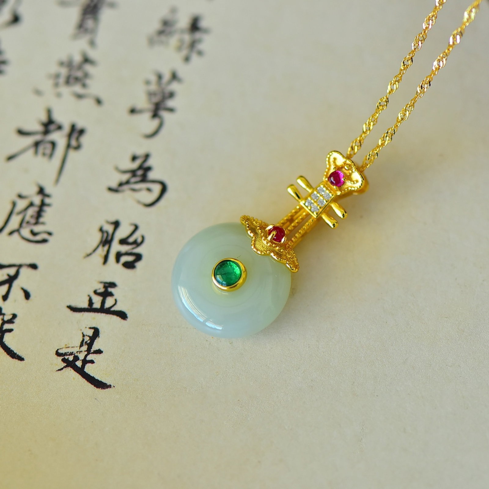 An Exquisite Sterling Silver-Gold Plated Inlaid Greenish Jade Pendant: An Exquisite Sterling Silver-Gold Plated Inlaid Greenish Jade Pendant,Size:15mmx15mm 纯银镀金镶青白玉吊坠