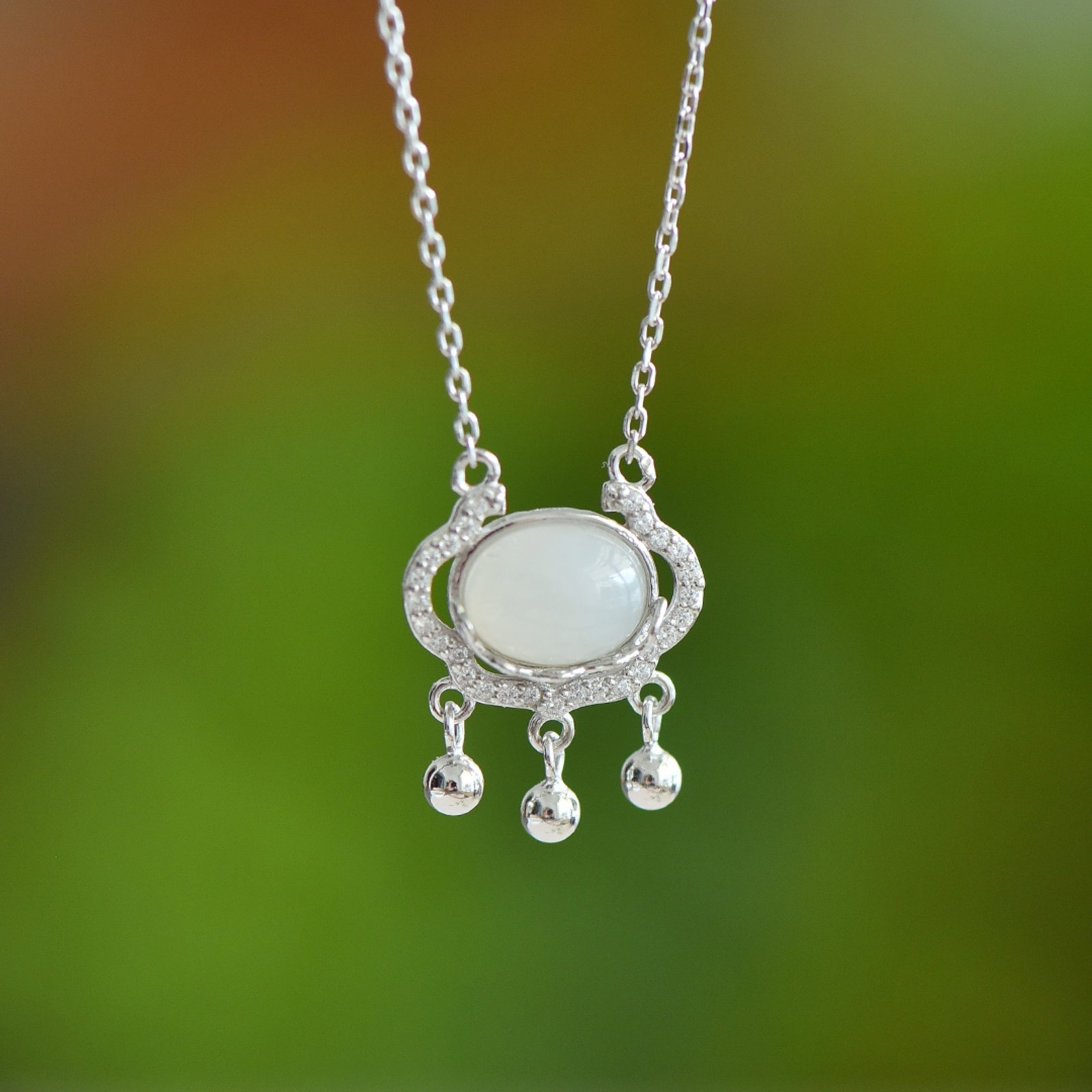 An Exquisite Sterling Silver Inlaid White Jade Pendant: An Exquisite Sterling Silver Inlaid White Jade Pendant, 纯银镶白玉吊坠