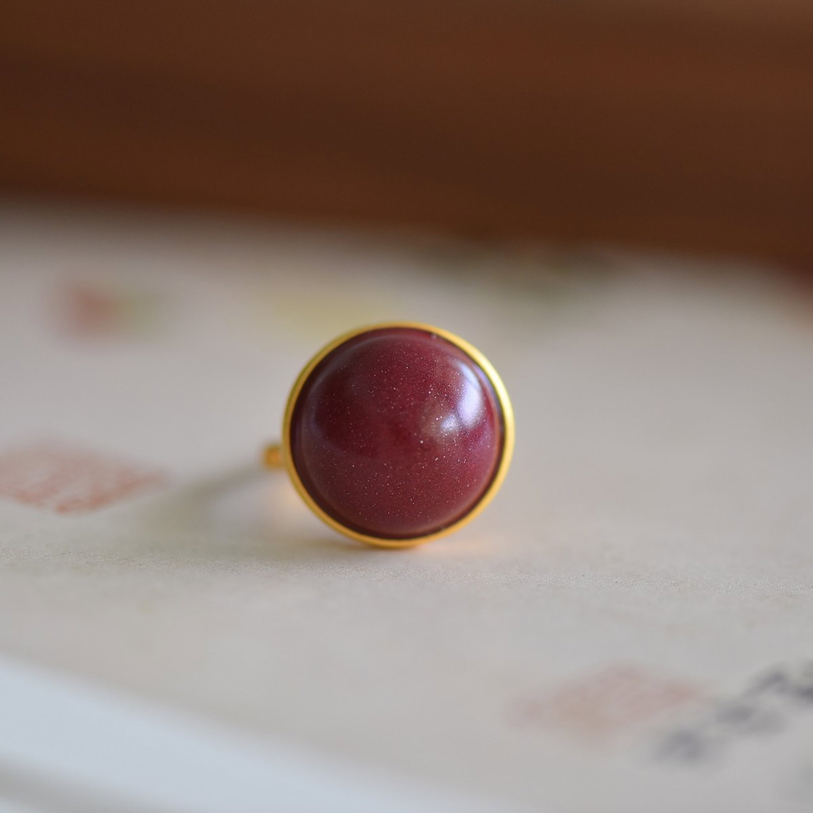 An Exquisite Sterling Silver-Gold Plated Inlaid Cinnabar Ring: An Exquisite Sterling Silver-Gold Plated Inlaid Cinnabar Ring,Size:16mmx16mm 寓意:财源广进、圆圆满满