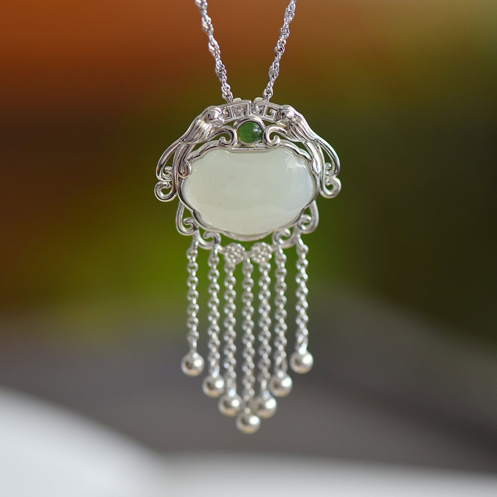 An Exquisite Sterling Silver Inlaid White Jade Pendant: An Exquisite Sterling Silver Inlaid White Jade Pendant,Size:13mmx18mm 纯银镶白玉吊坠