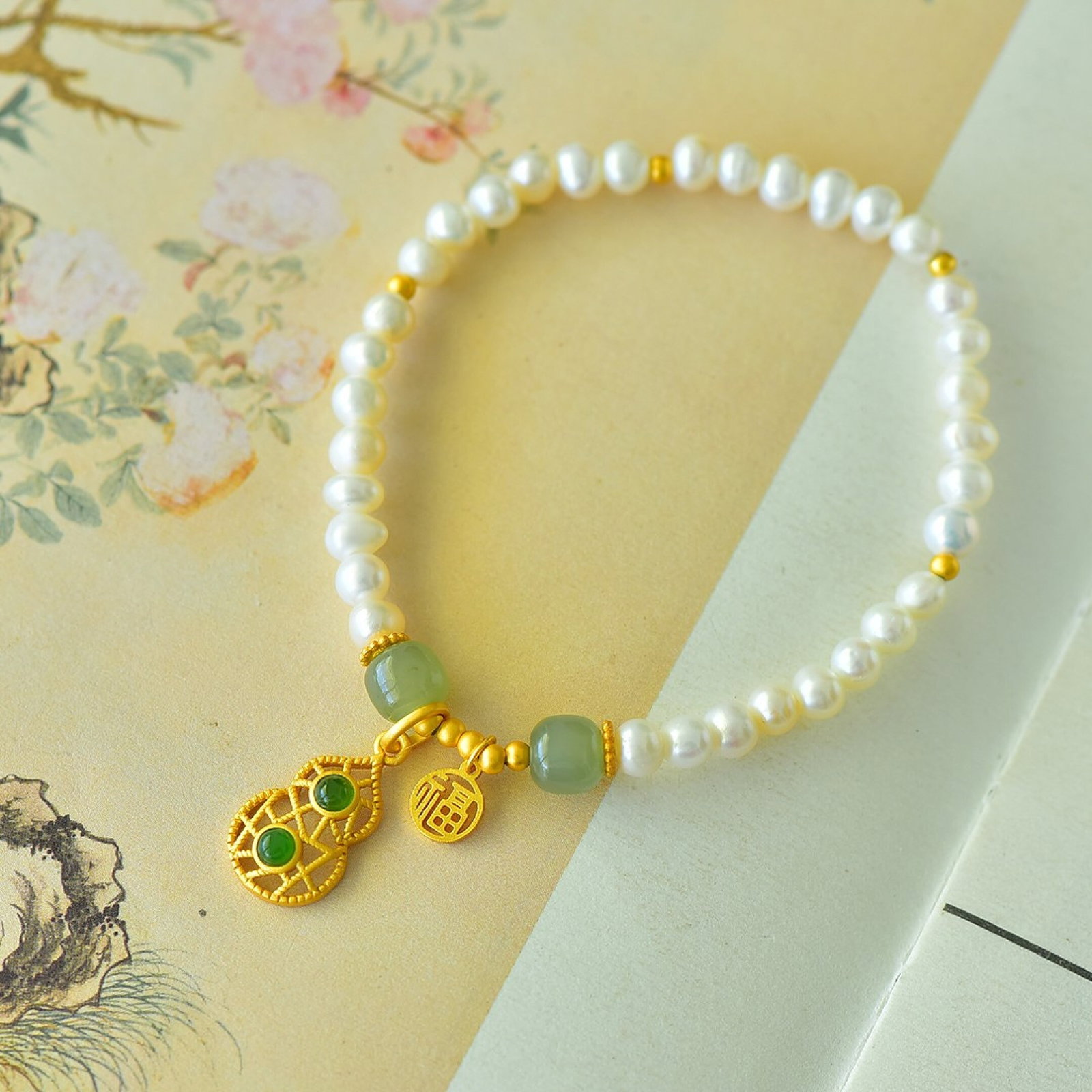 An Exquisite Sterling Silver-Gold Plated Inlaid White Jade Bracelet: An Exquisite Sterling Silver-Gold Plated Inlaid White Jade Bracelet 纯银镀金镶白玉手链