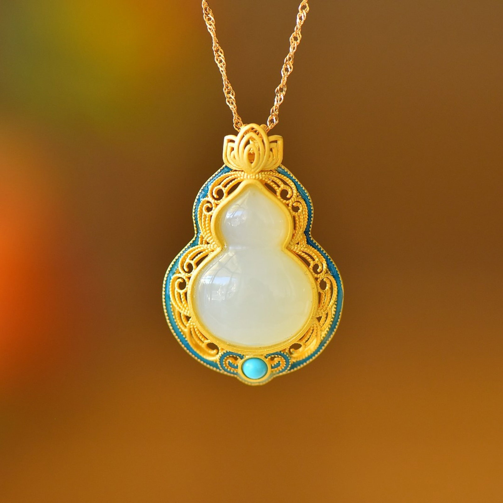 An Exquisite Sterling Silver-Gold Plated Inlaid White Jade Pendant: An Exquisite Sterling Silver-Gold Plated Inlaid White Jade Pendant 纯银镀金镶白玉吊坠