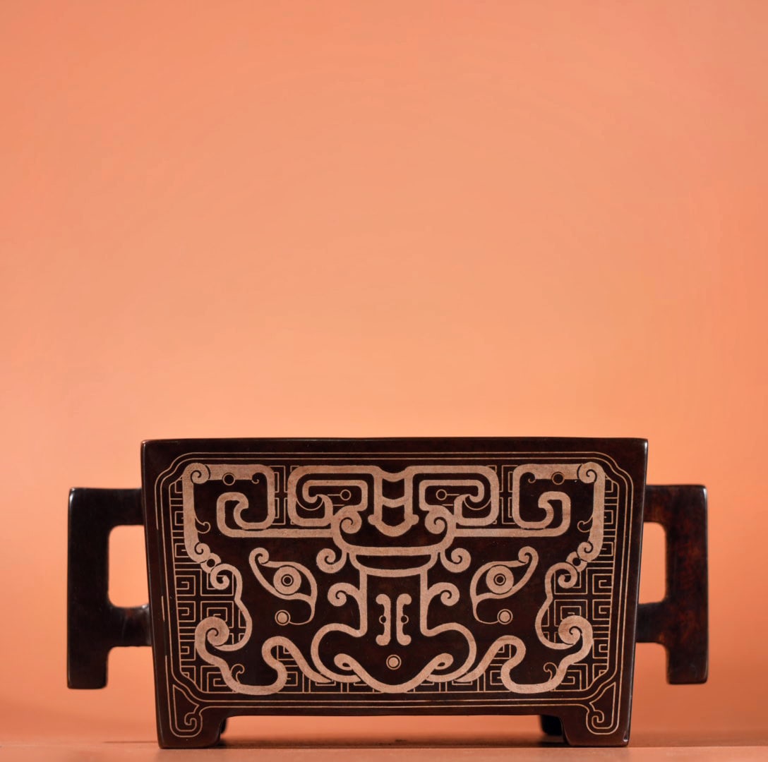 A Exquisite Bronze Inlaid with Silver Beast-Face Pattern Censer: A Exquisite Bronze Inlaid with Silver Beast-Face Pattern Censer,Ming Dynasty, China,With Mark,Size:2inx3.5inx2.7in,Weight:995g 紫铜错银兽面纹炉,中