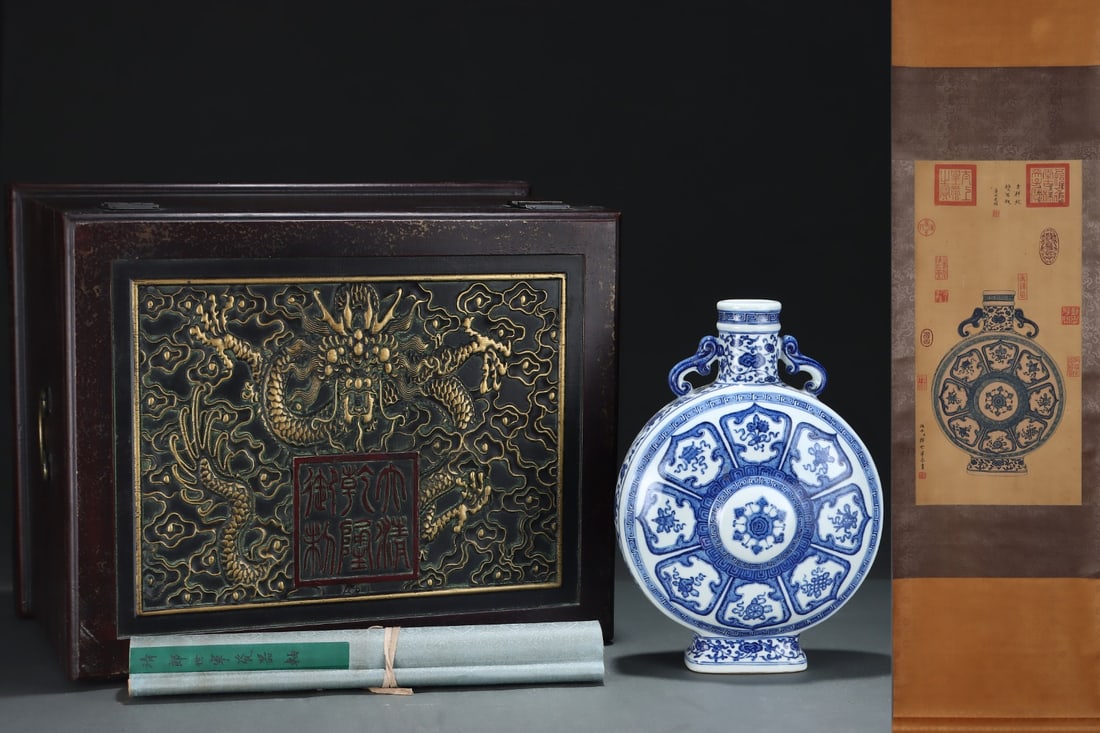 A Exquisite Blue and White Eight Treasures Pattern Double-Ears Vase: A Exquisite Blue and White Eight Treasures Pattern Double-Ears Vase,Qing Dynasty, China,Qianlong Six-character Mark,Size:12.7inx9.3in 青花八宝纹双耳瓶,&