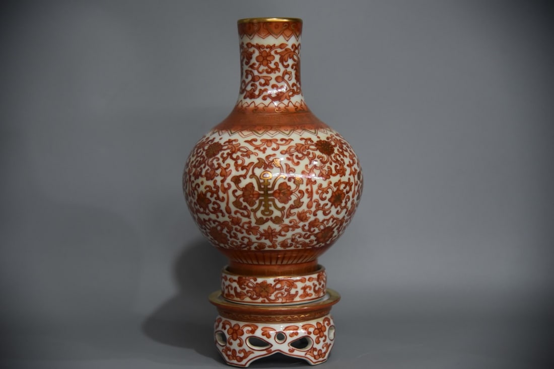 A Exquisite Iron-Red Painted Gold Lotus Pattern Vase: A Exquisite Iron-Red Painted Gold Lotus Pattern Vase,Qing Dynasty, China,Yongzheng Four-character Mark,Size:6.3inx11.8in 矾红描金缠枝莲纹瓶,ߑ