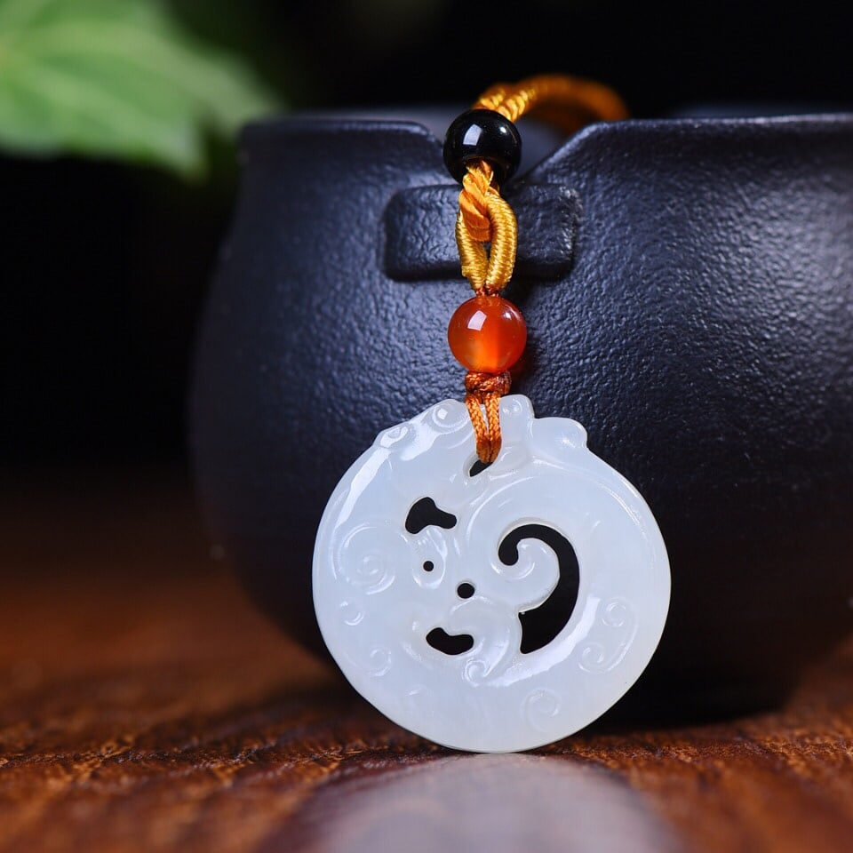 A Exquisite Hotan Jade Hollow Dragon Pendant: A Exquisite Hotan Jade Hollow Dragon Pendant,Size:1.2inx1.1inx0.3in 和田玉镂空龙吊坠