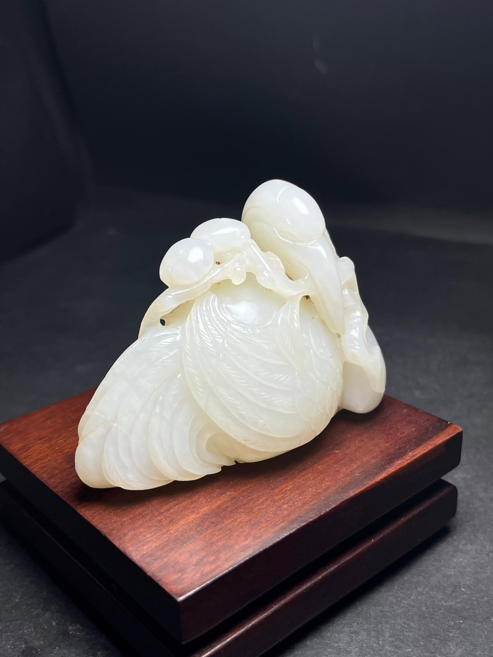 An Exquisite White Jade Crane Hand Piece: An Exquisite White Jade Crane Hand Piece,Qing Dynasty,China,Size:77mmx37mmx56mm,Weight:166g 白玉鹤手把件,中国清代