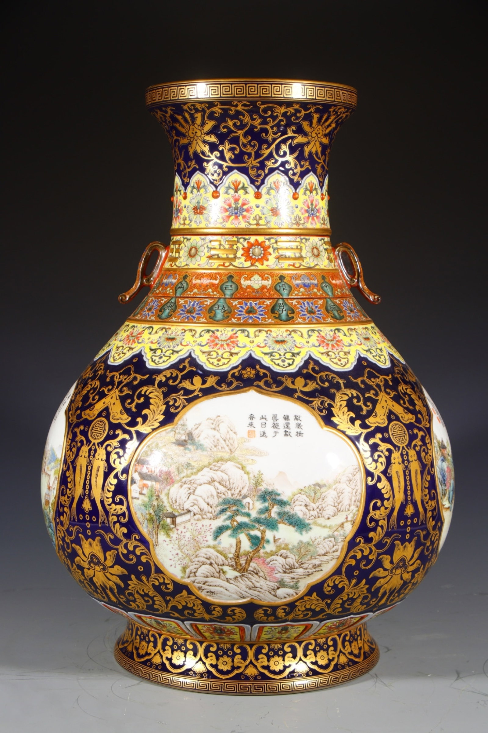 A Huge Enamel Ji Blue Glazed Painted Gold Landscape and Figure Pattern Double-Ears Vase,With Poem: A Huge Enamel Ji Blue Glazed Painted Gold Landscape and Figure Pattern Double-Ears Vase,With Poem, Qing Dynasty, China,Qianlong Six-character Mark,Size:20.5inx7.5inx9.6in 珐琅彩Ƃ