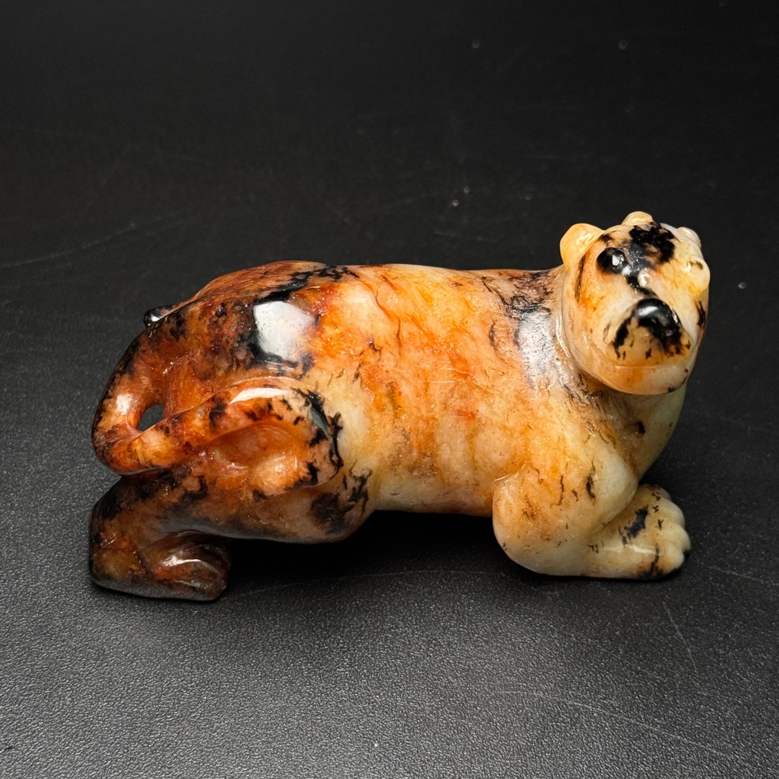 An Exquisite White Jade Auspicious Beast Hand Piece: An Exquisite White Jade Auspicious Beast Hand Piece,Qing Dynasty,China,Size:80mmx53mmx40mm,Weight:204g 白玉瑞兽手把件,中国清代