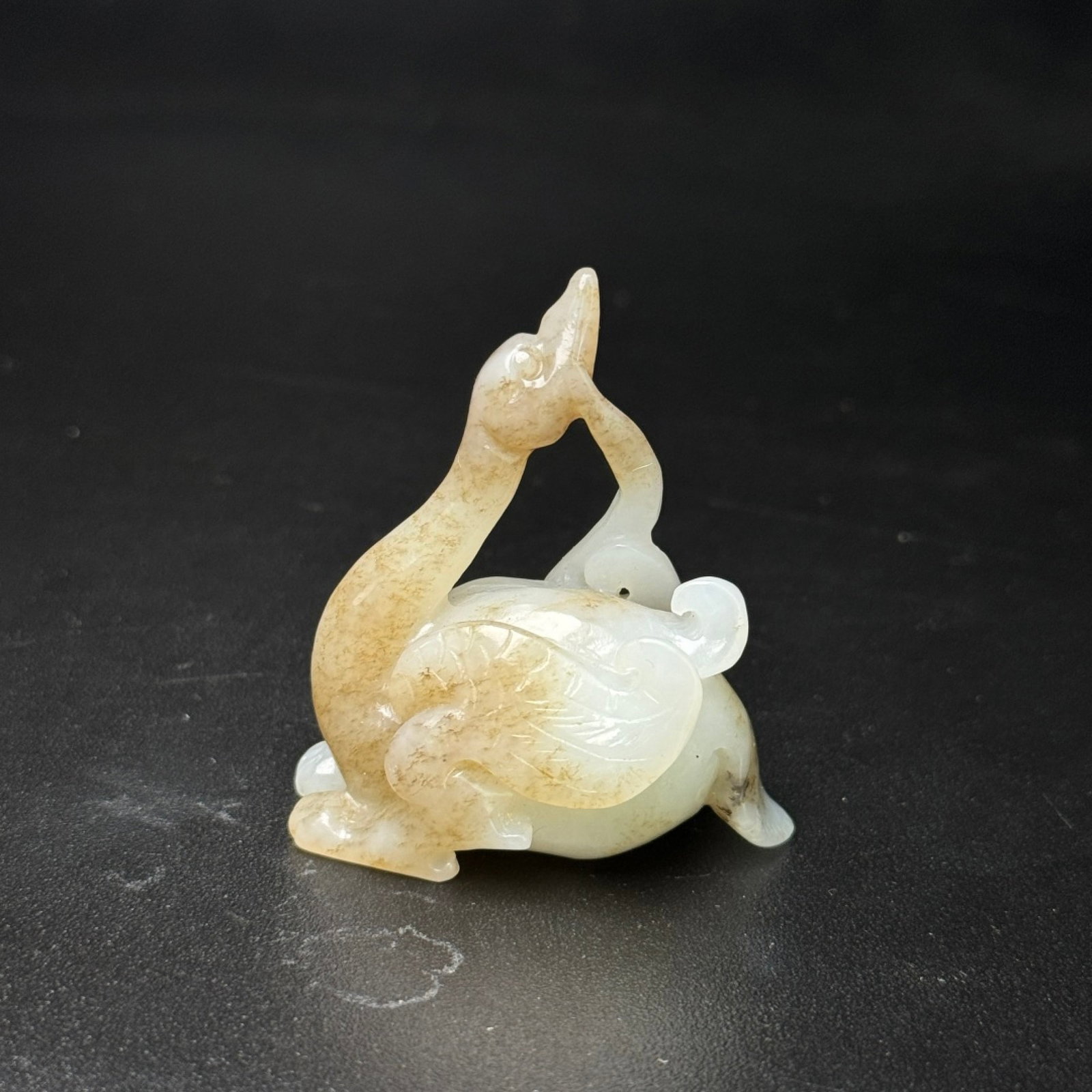 An Exquisite White Jade Crane Pendant: An Exquisite White Jade Crane Pendant,Qing Dynasty,China,Size:48mmx43mmx25mm,Weight:36g 白玉鹤挂件,中国清代