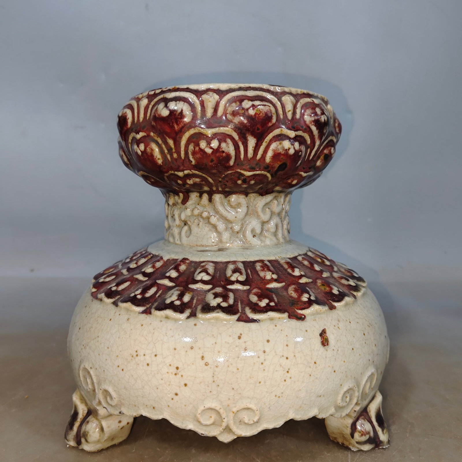 An Exquisite Underglaze-Red Tripod Ornament: An Exquisite Underglaze-Red Tripod Ornament,Qing Dynasty,China,Size:7.1inx7.9in 釉里红三足摆件,中国清代