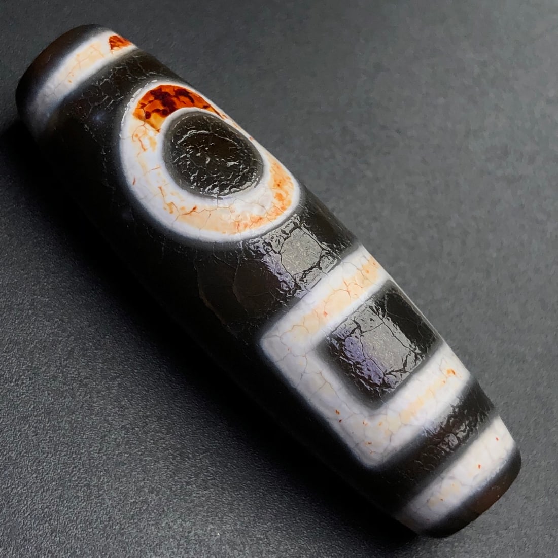 An Exquisite Dzi Bead Pendant: An Exquisite Dzi Bead Pendant,Size:49mmx15mm,Weight:16.5g 天珠挂件