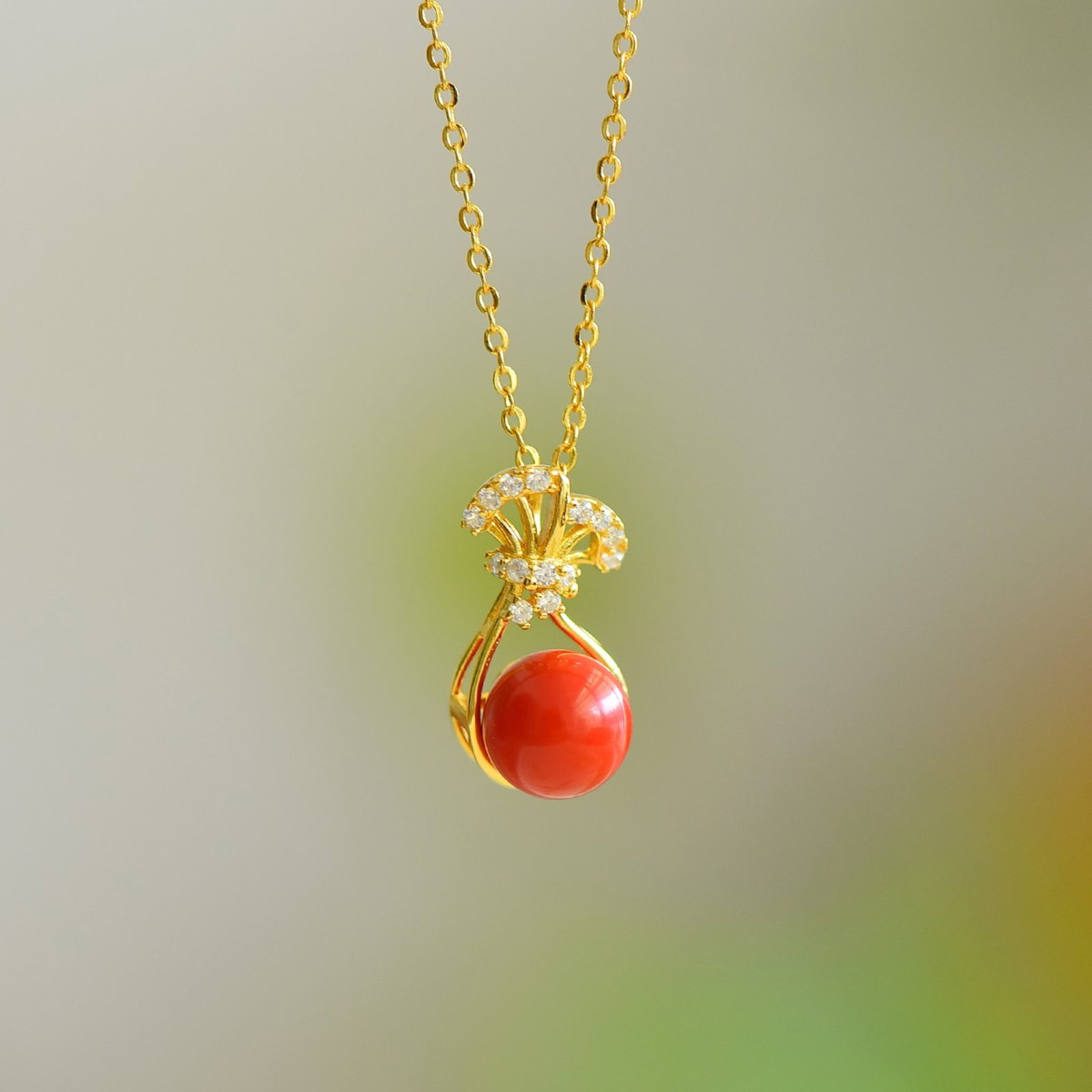An Exquisite Sterling Silver-Gold Plated Inlaid Cinnabar Pendant: An Exquisite Sterling Silver-Gold Plated Inlaid Cinnabar Pendant,Size:8mmx8mm 寓意:财源滚滚,平安幸运