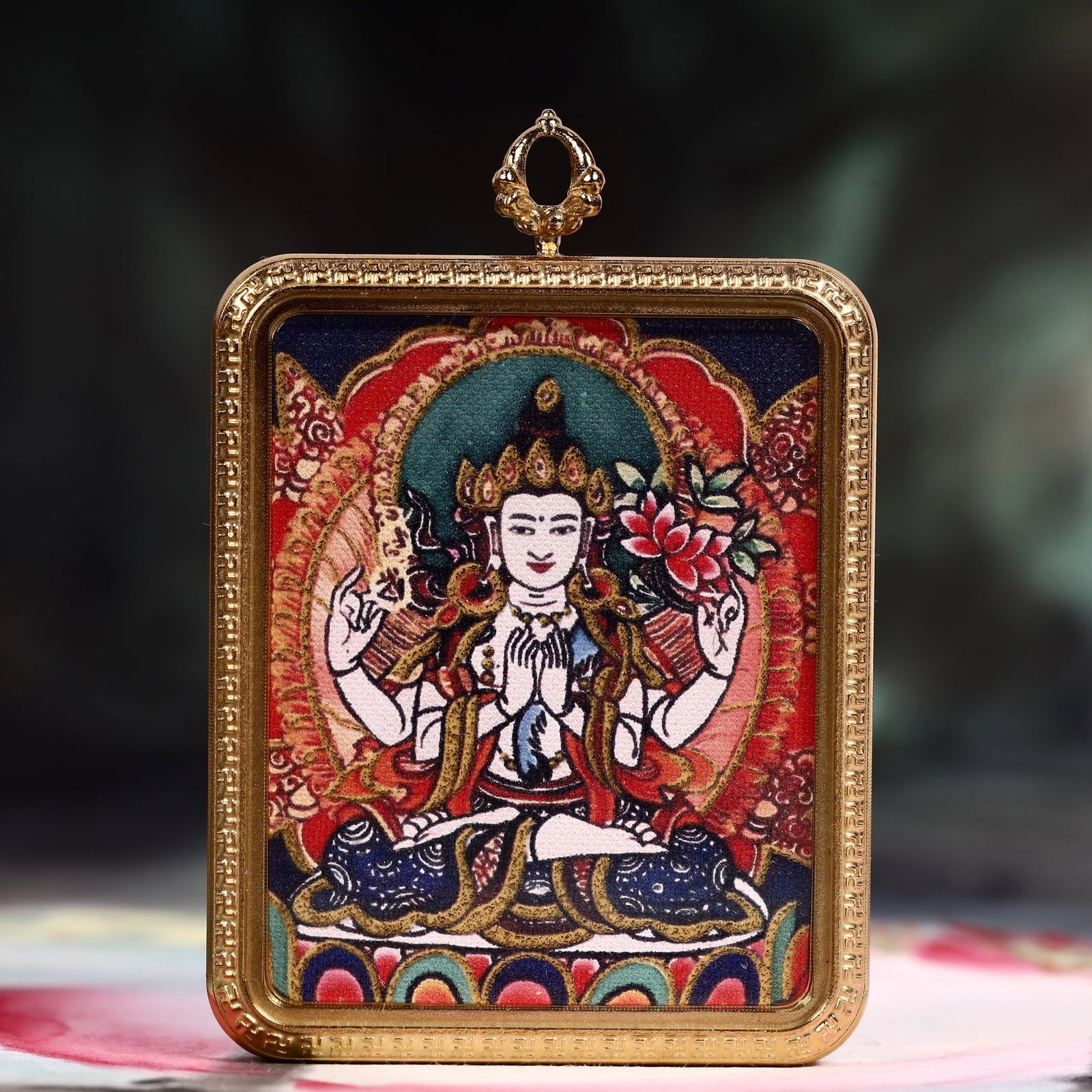 An Exquisite Painted Color Statue of Four-Armed Guanyin Tangka: An Exquisite Painted Color Statue of Four-Armed Guanyin Tangka,Size:2inx2.8in 彩绘四臂观音像唐卡