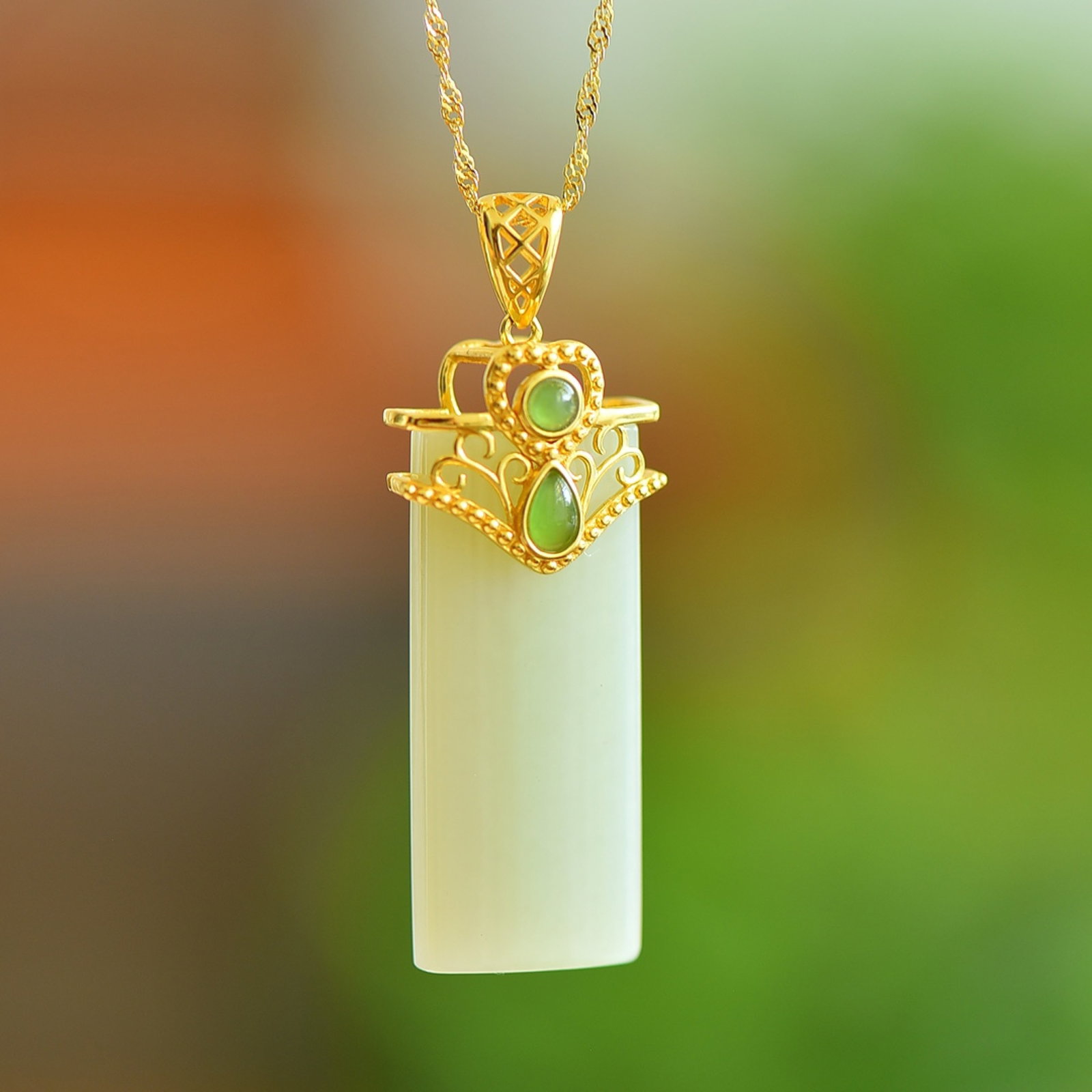 An Exquisite Sterling Silver-Gold Plated Inlaid White Jade Pendant,Inlaid Jasper: An Exquisite Sterling Silver-Gold Plated Inlaid White Jade Pendant,Inlaid Jasper,Size:15mmx35mm 一个精美的纯银镀金镶白玉吊