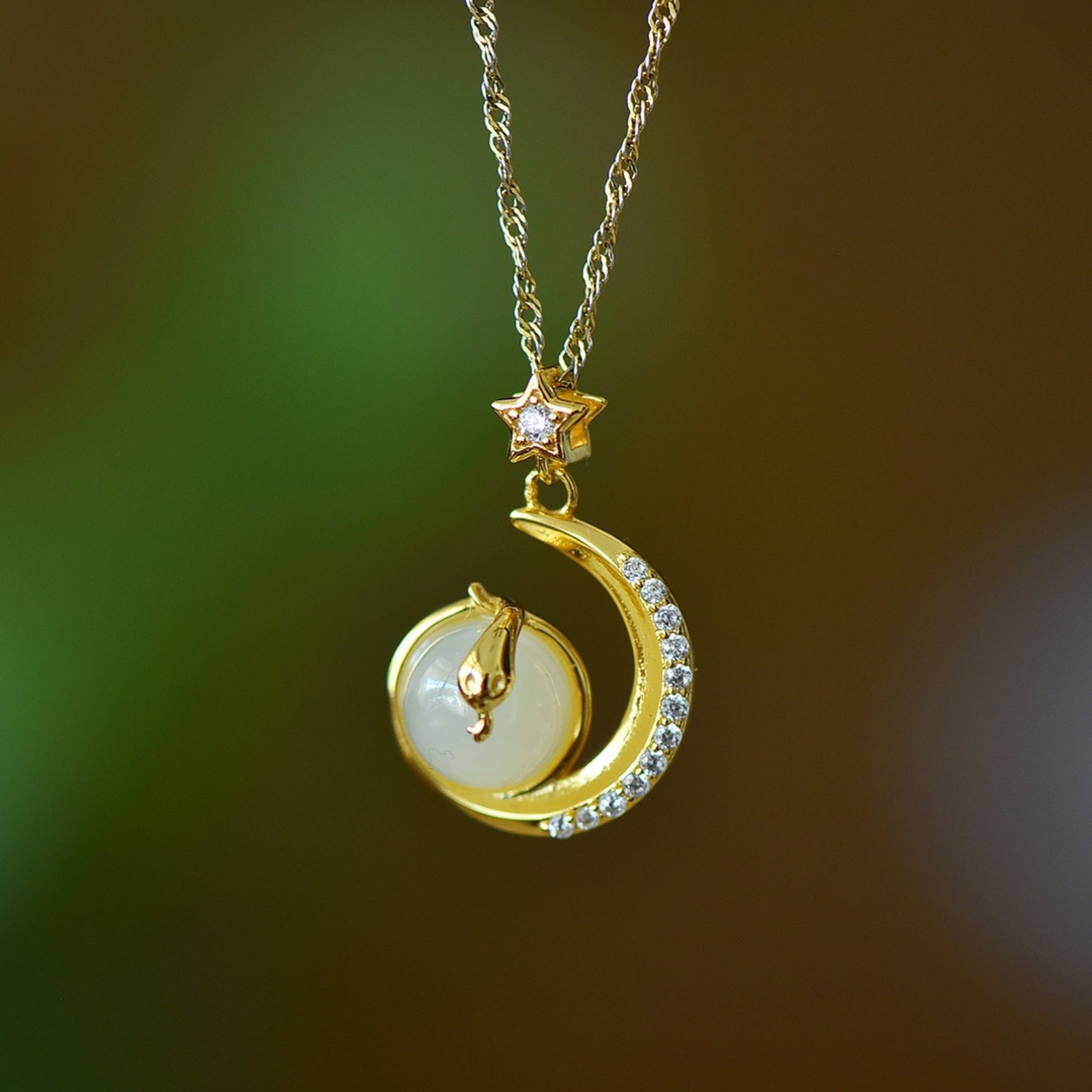 An Exquisite Sterling Silver-Gold Plated Inlaid White Jade Pendant: An Exquisite Sterling Silver-Gold Plated Inlaid White Jade Pendant,Size:8mmx8mm 纯银镀金镶白玉吊坠