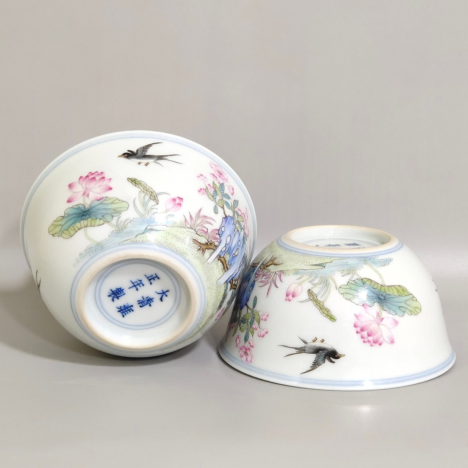 A Pair of Exquisite Famille-Rose Seawater Flower and Bird Pattern Cups: A Pair of Exquisite Famille-Rose Seawater Flower and Bird Pattern Cups,Qing Dynasty,China,Yongzheng Six-character Mark,Size:1.8inx3.5in 一对粉彩海水花鸟